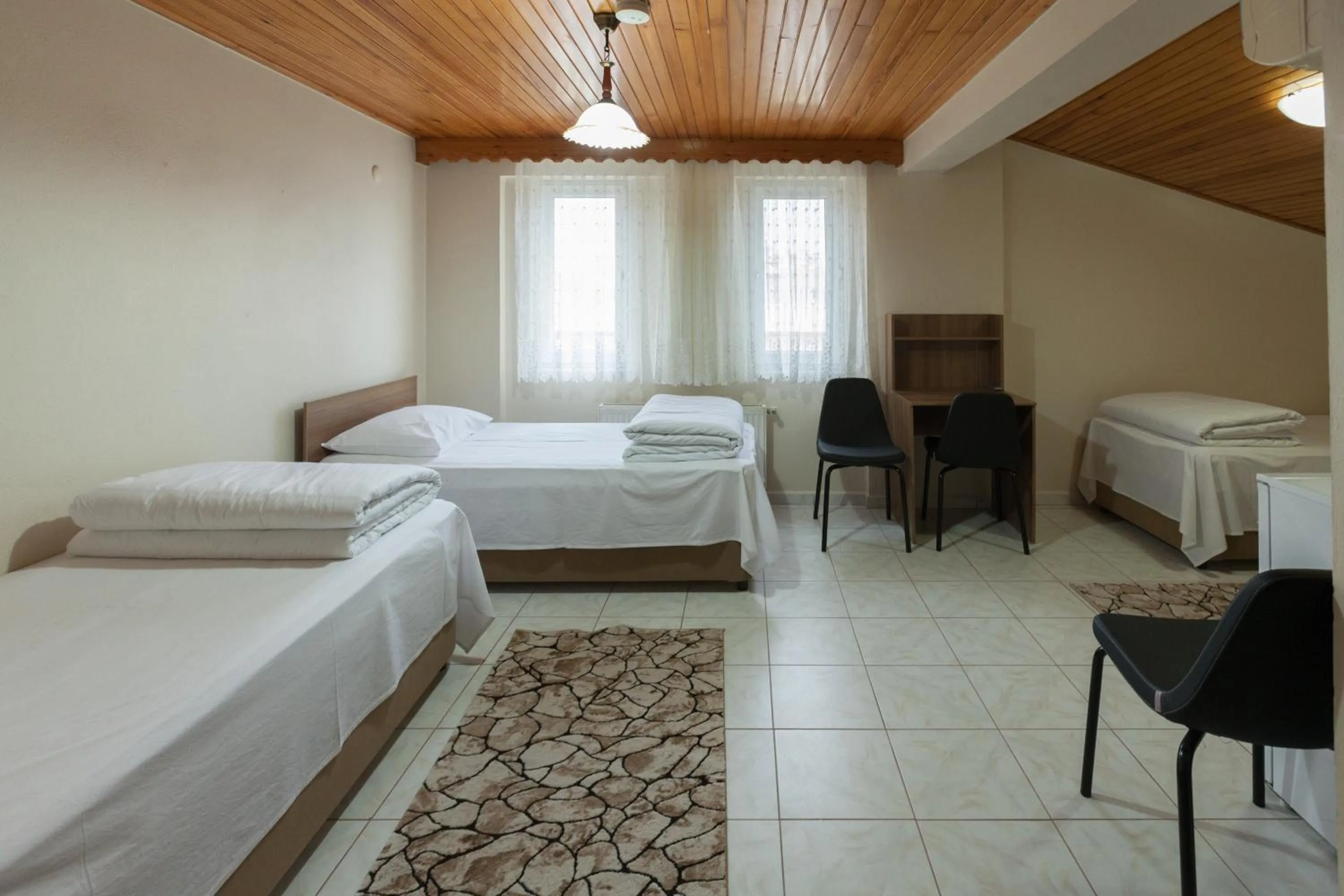 Photo of the whole room, Bed in Gizem Pansiyon