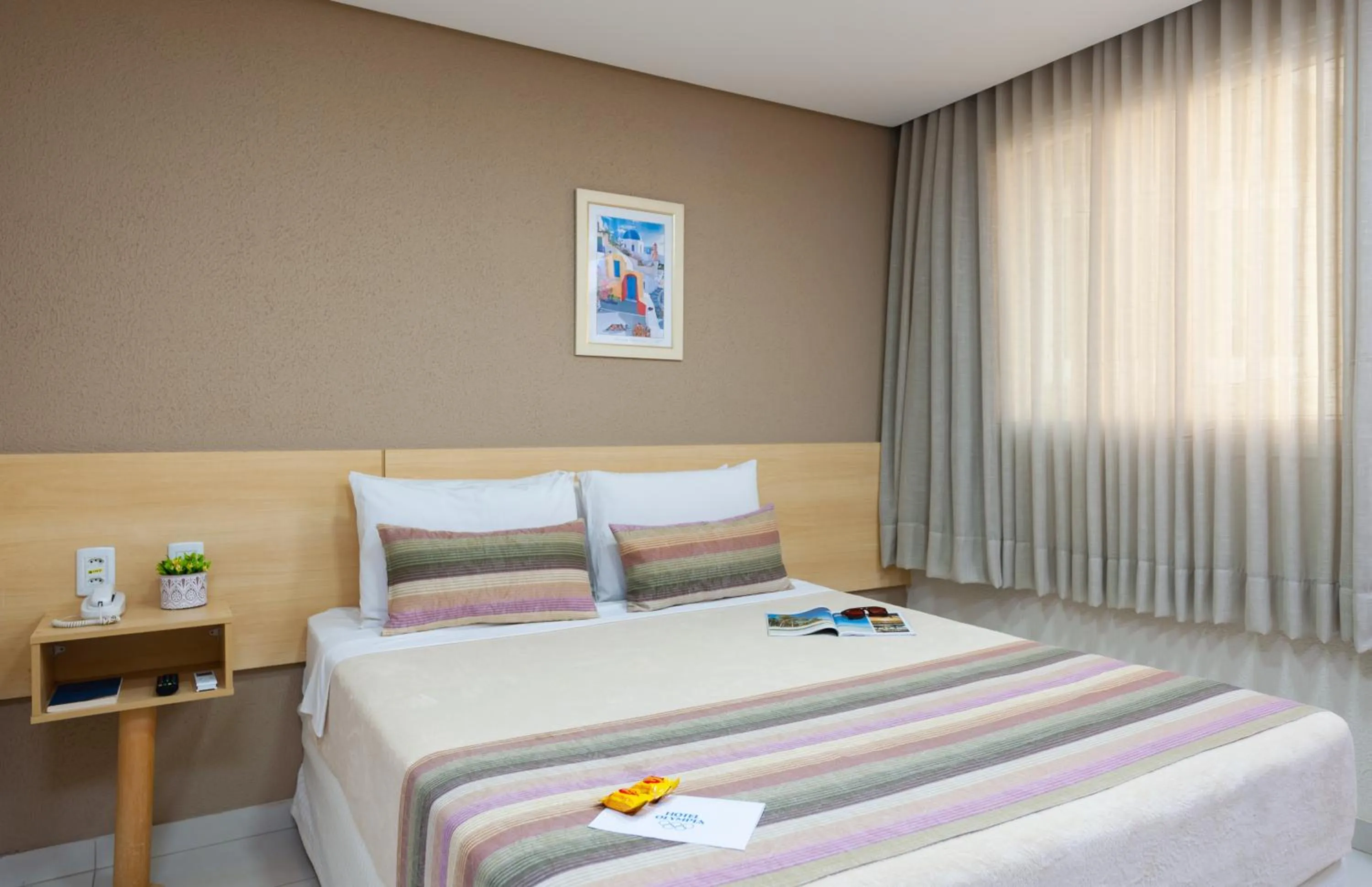 Bed in Hotel Olympia