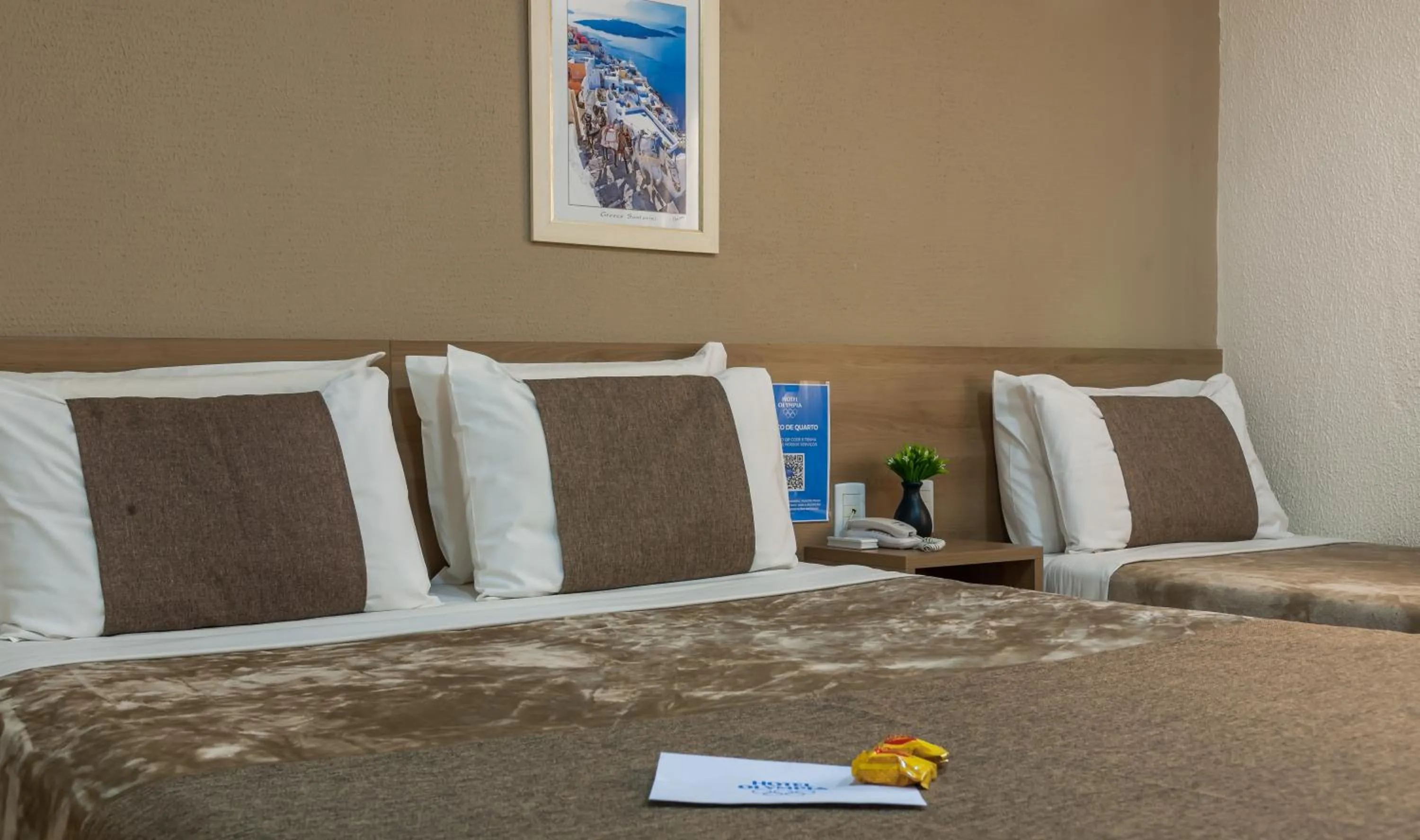 Bed in Hotel Olympia