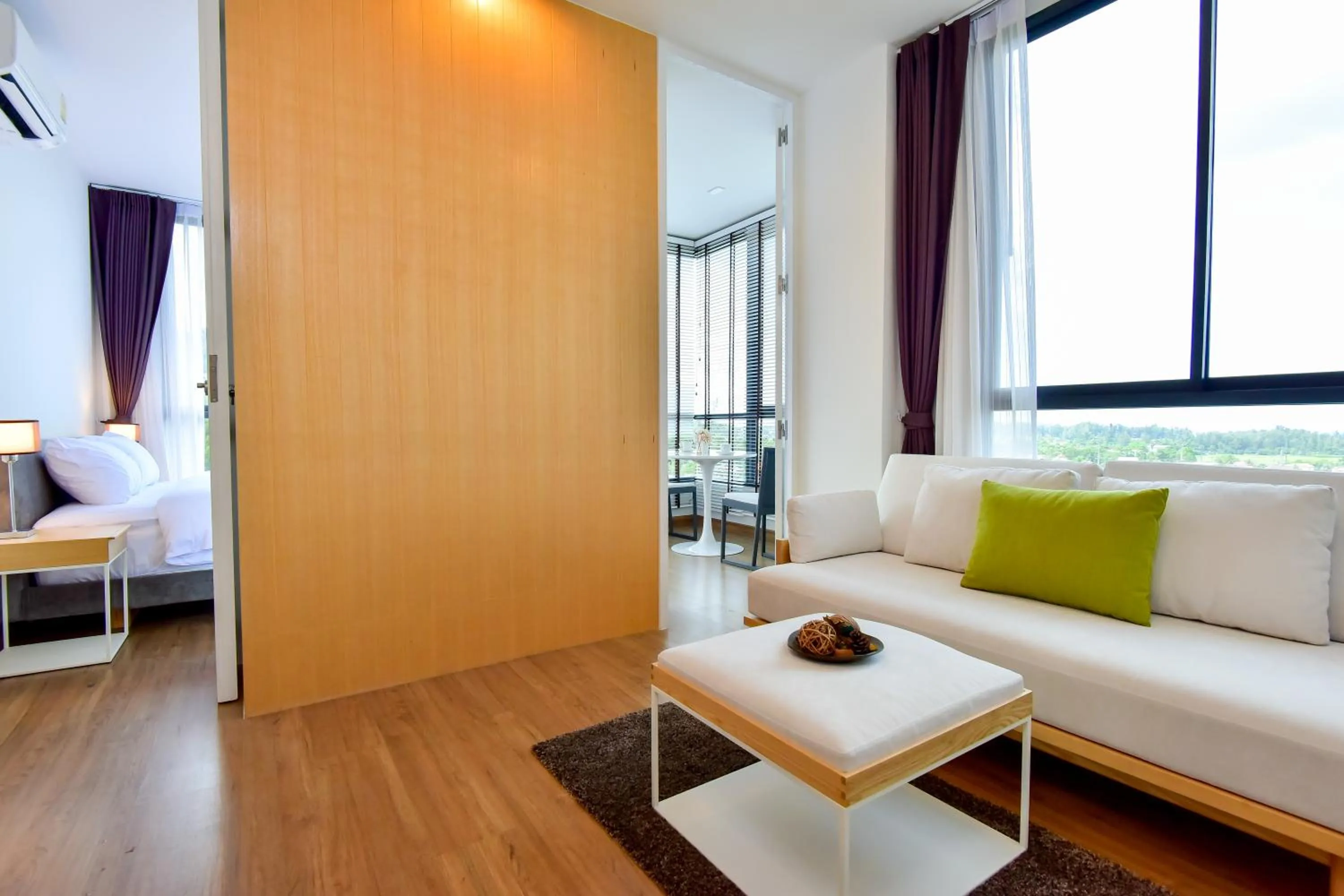 Communal lounge/ TV room, Bed in Hill Myna Condotel Official Account