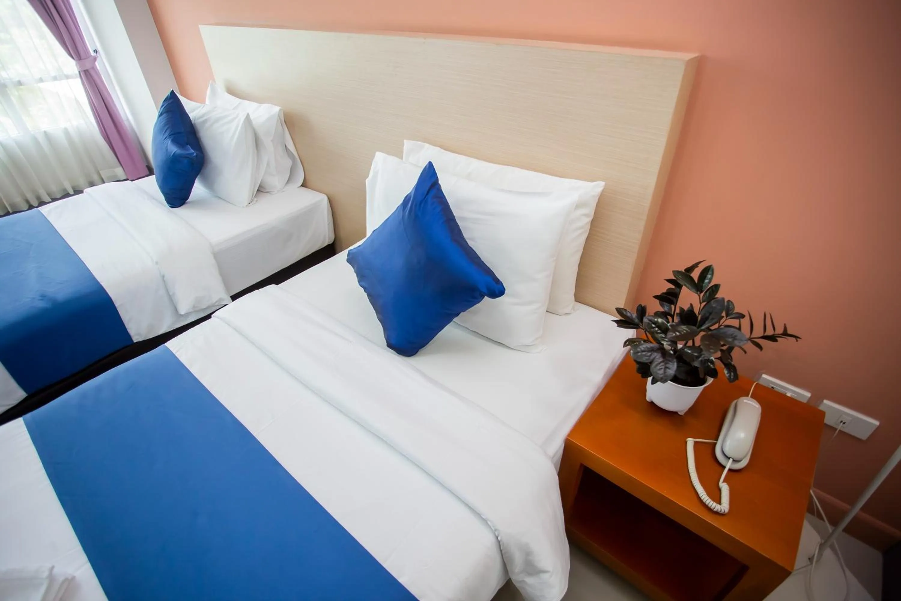 Bed in Nano Place Hotel