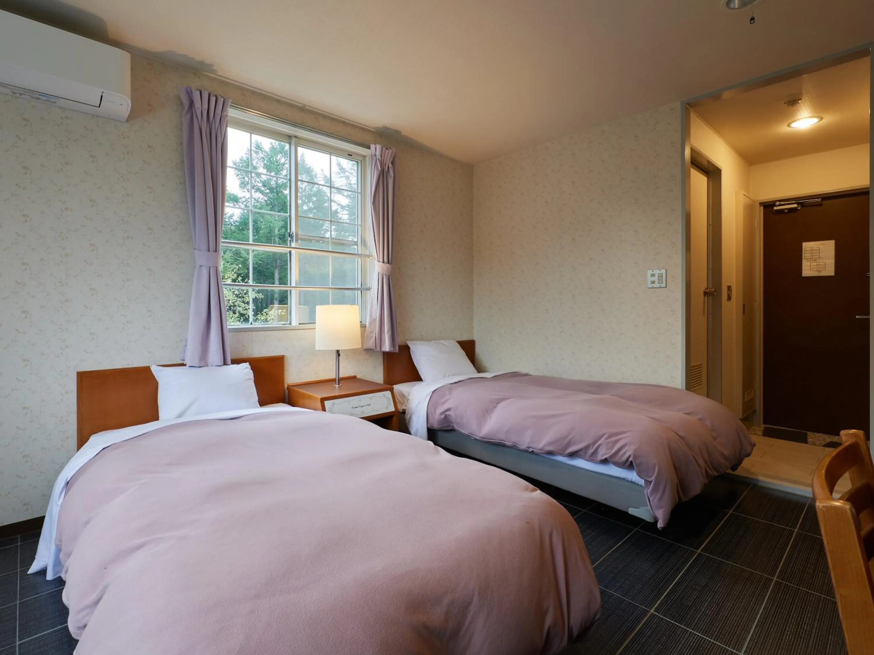 Photo of the whole room, Bed in Asama Kogen Hotel