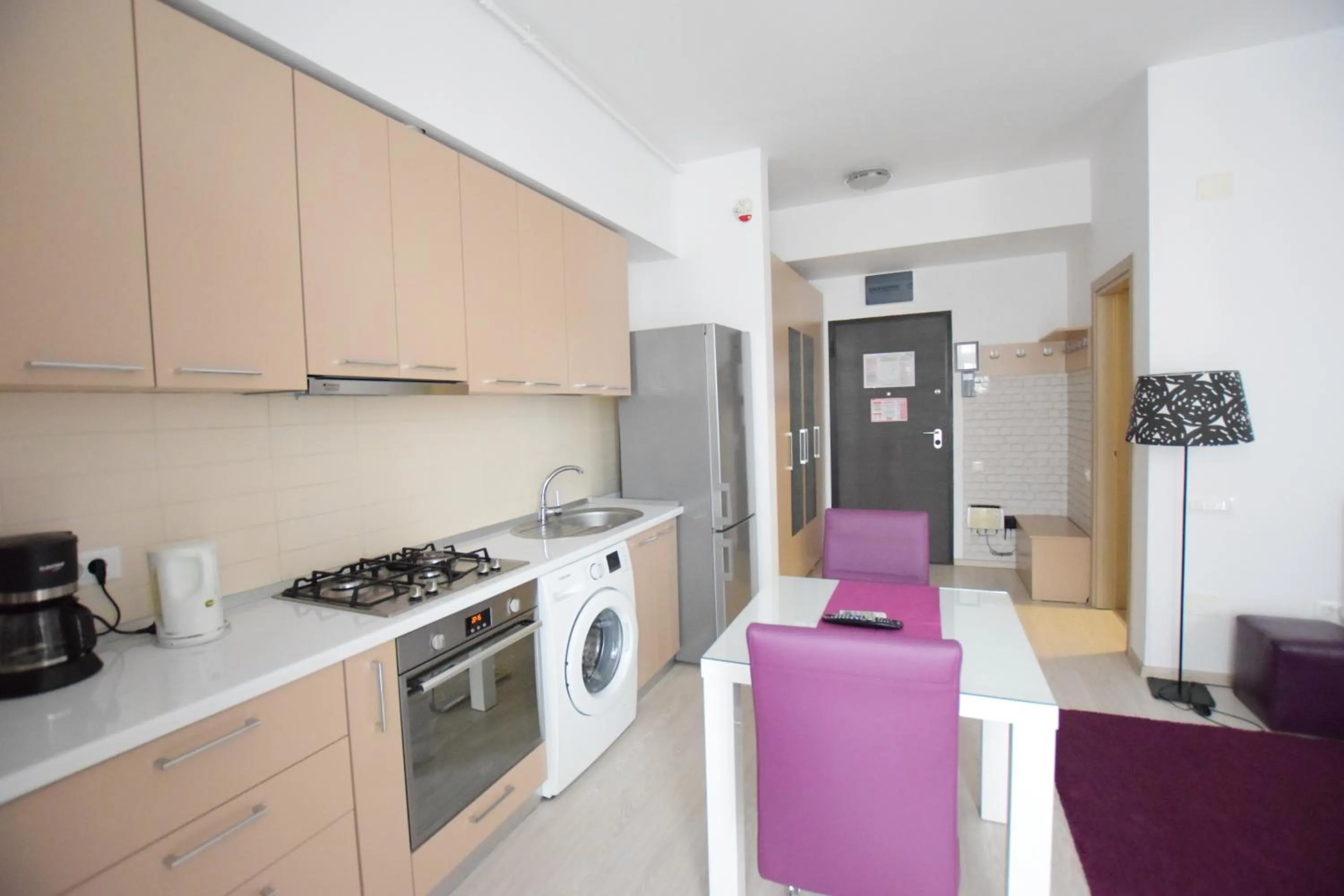 Kitchen or kitchenette in Uptown Residence Apartments