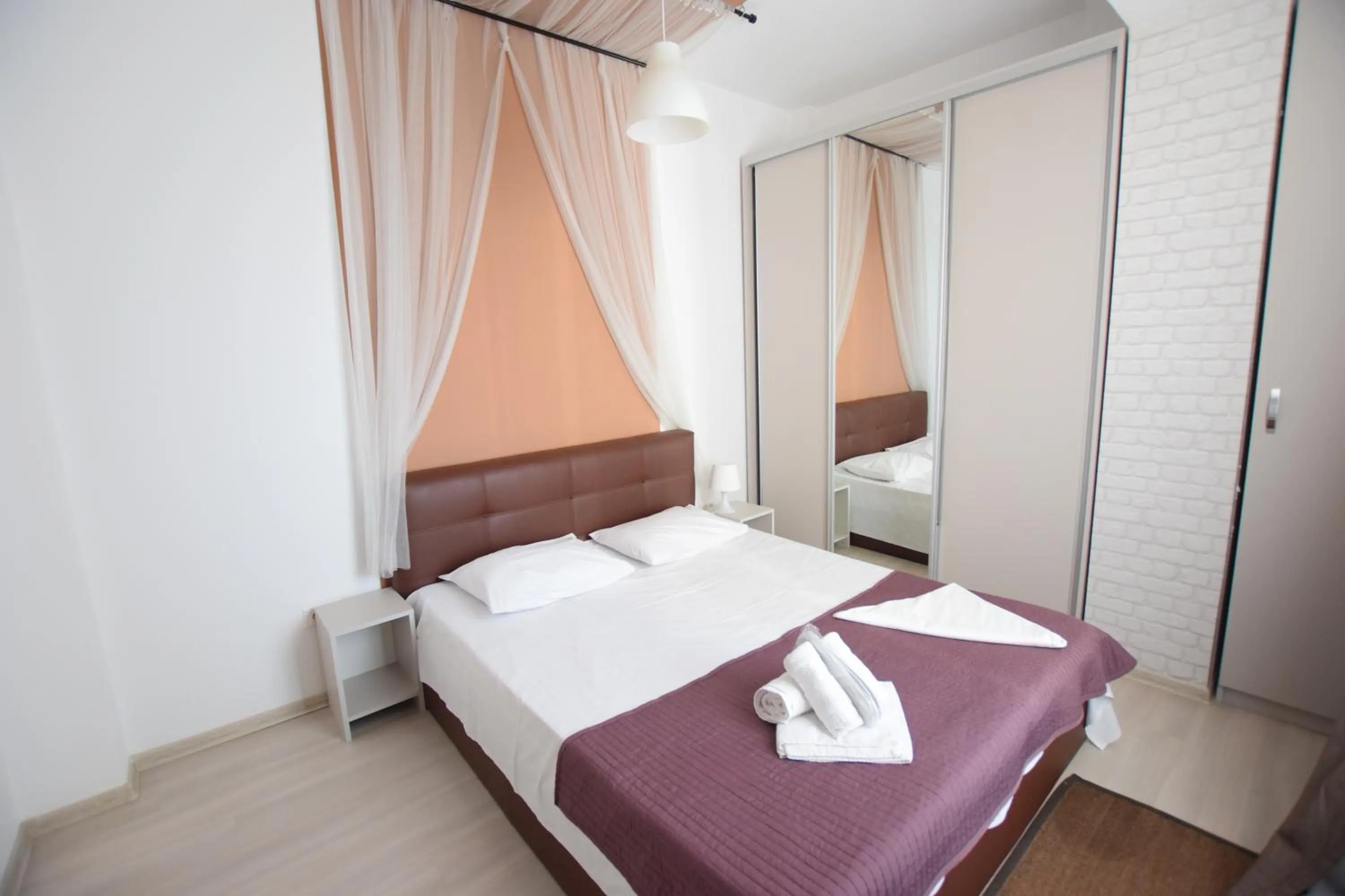 Bed in Uptown Residence Apartments