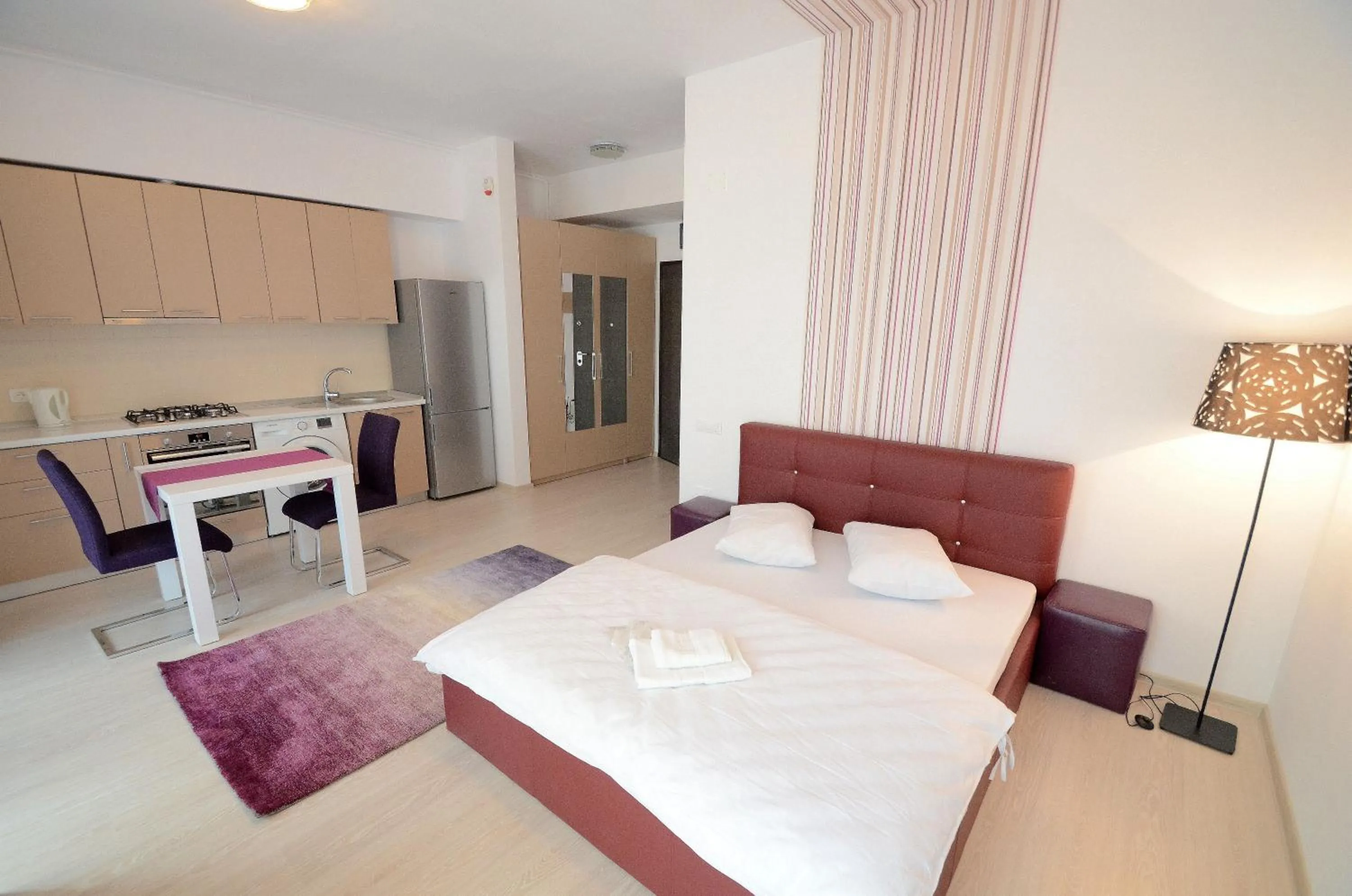 Photo of the whole room, Bed in Uptown Residence Apartments