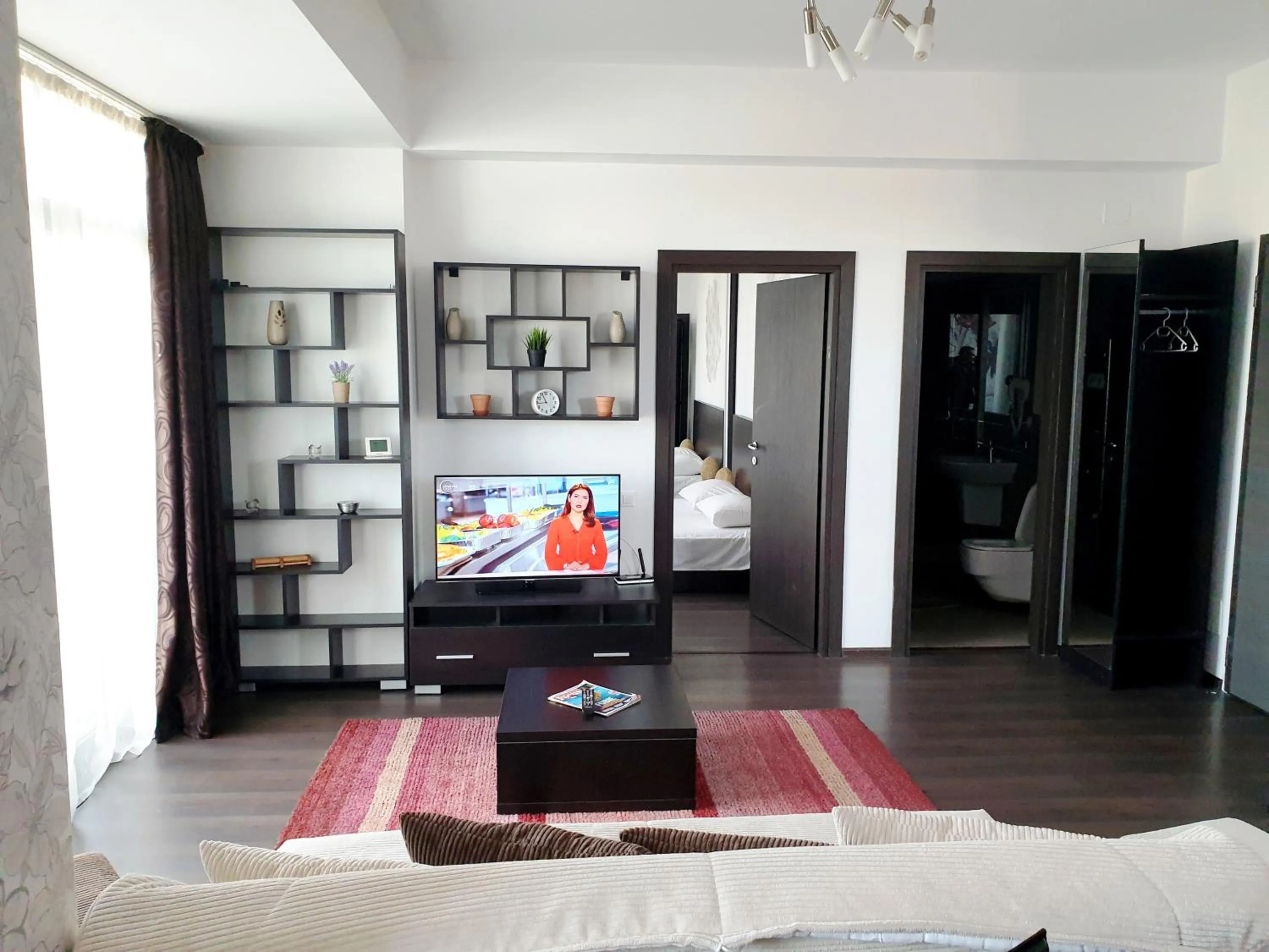 TV and multimedia in Uptown Residence Apartments