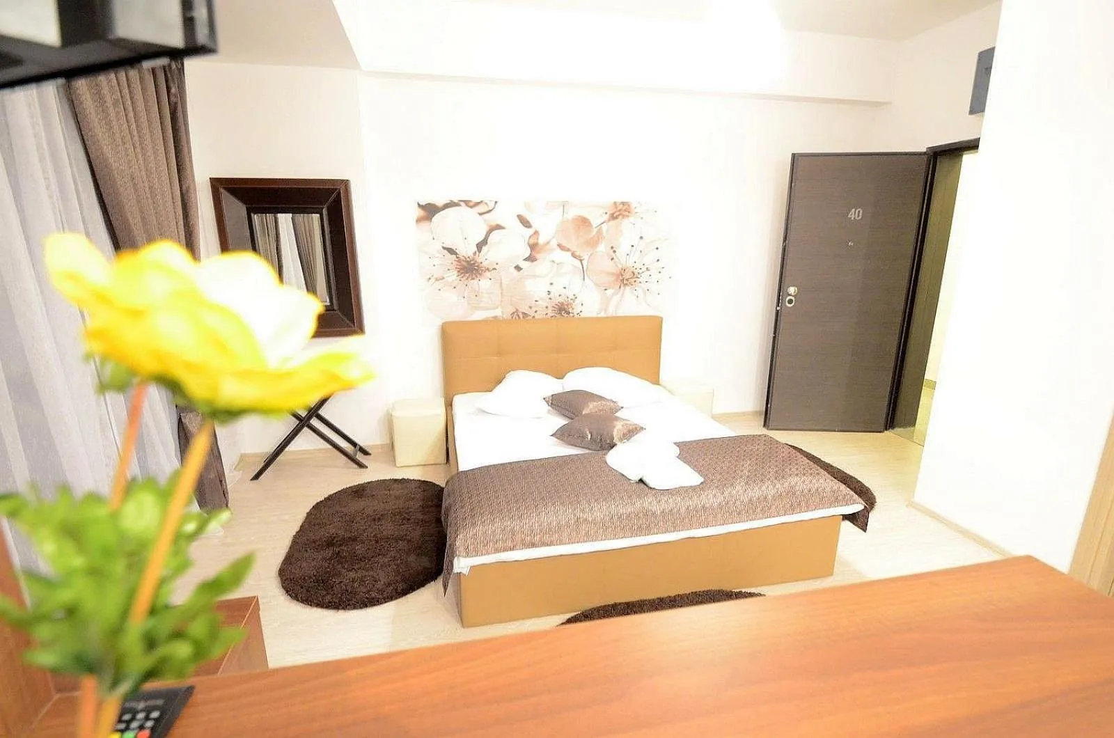 Bedroom, Bed in Uptown Residence Apartments