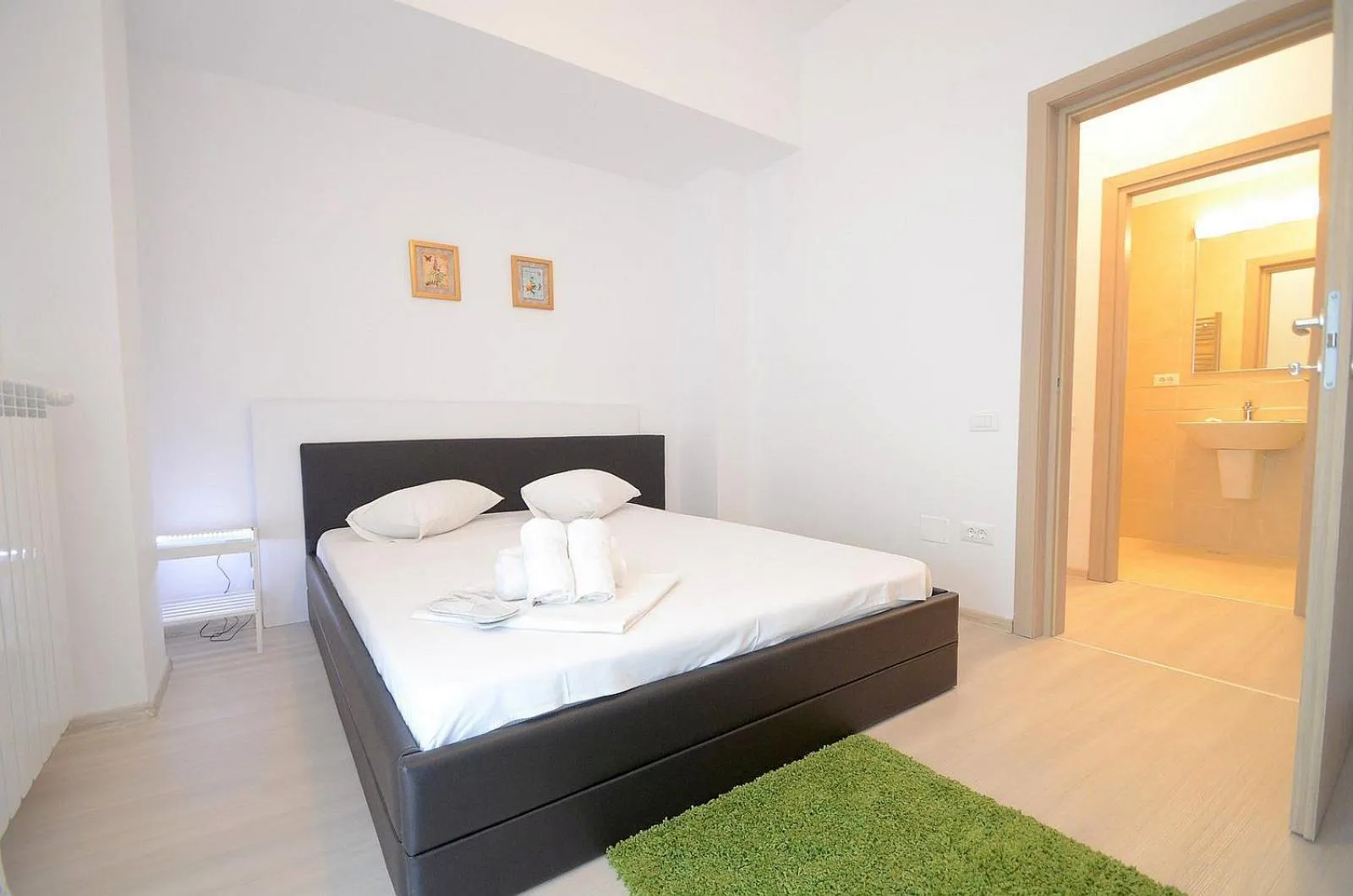 Bed in Uptown Residence Apartments