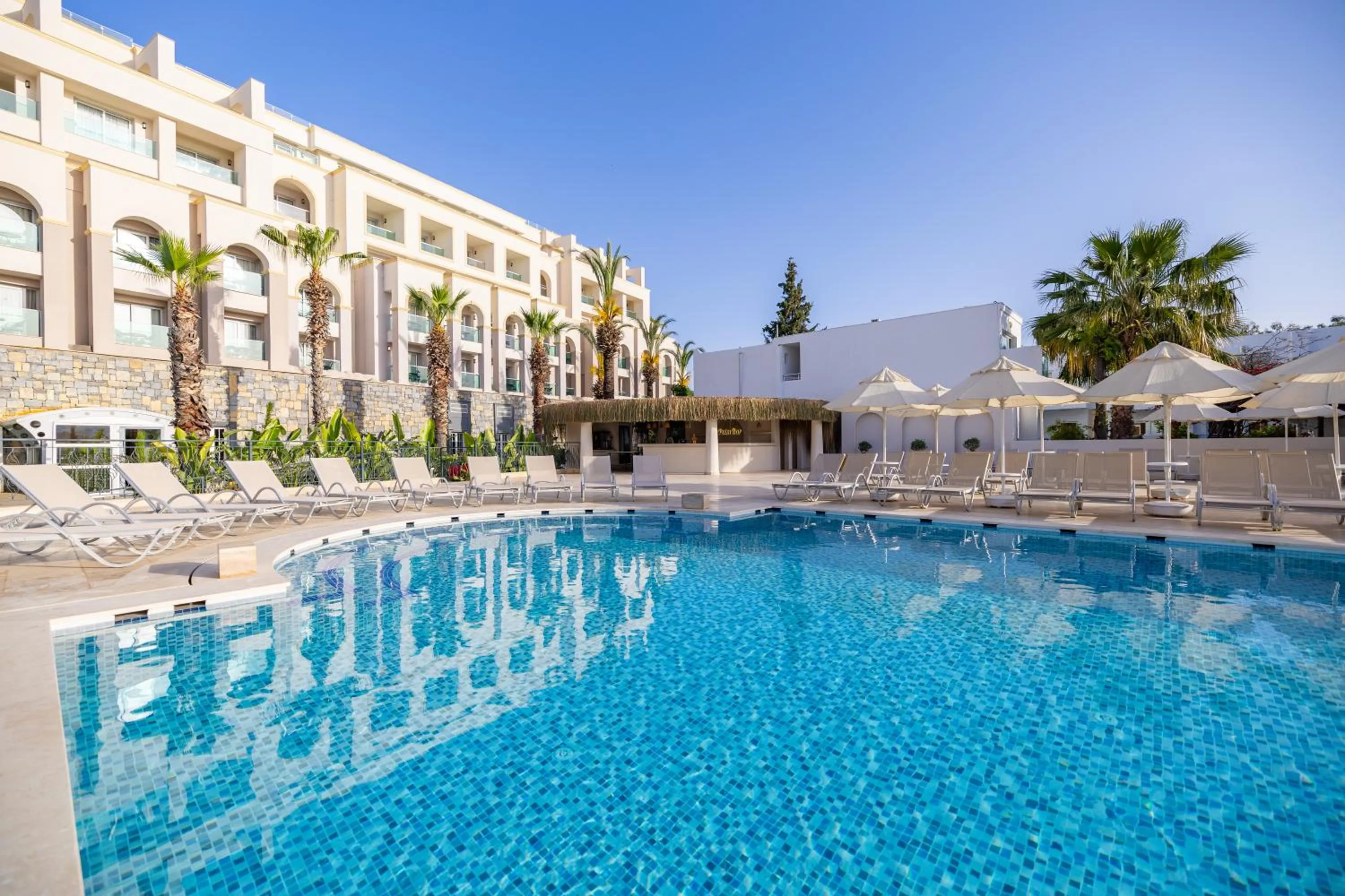 Swimming pool in Royal Asarlik Beach Hotel