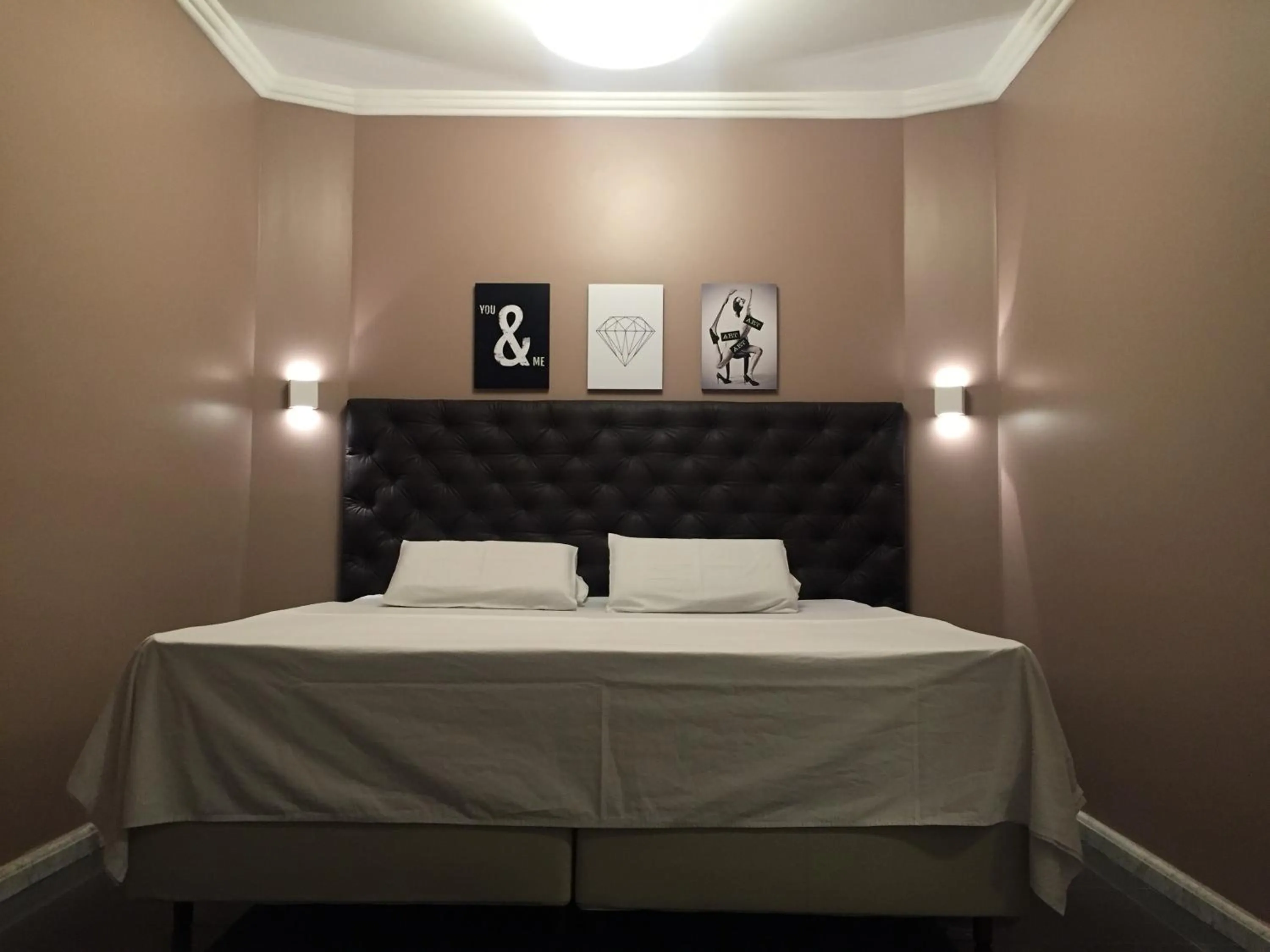 Property building, Bed in Hotel Diamante