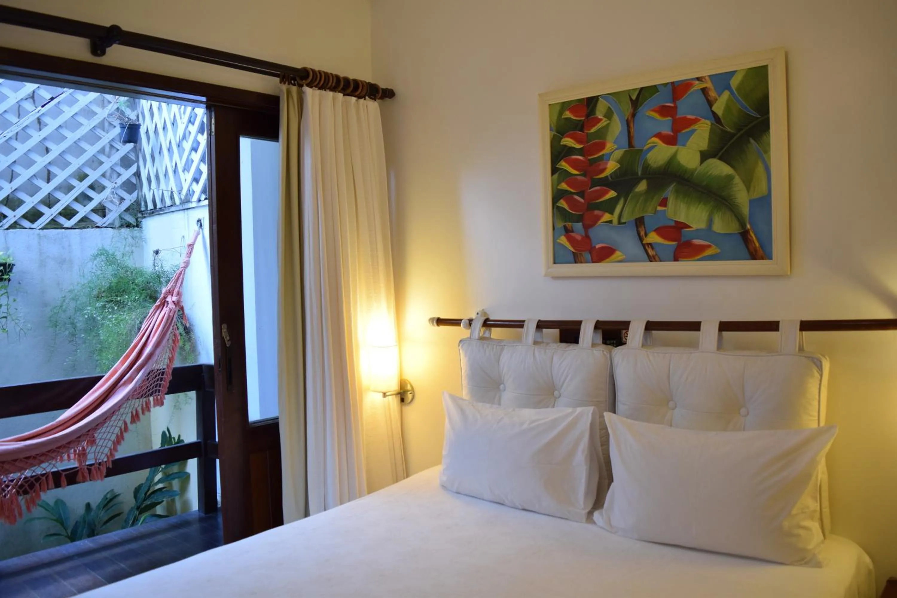 Bedroom, Bed in Hotel Pousada Encanto de Itapoan