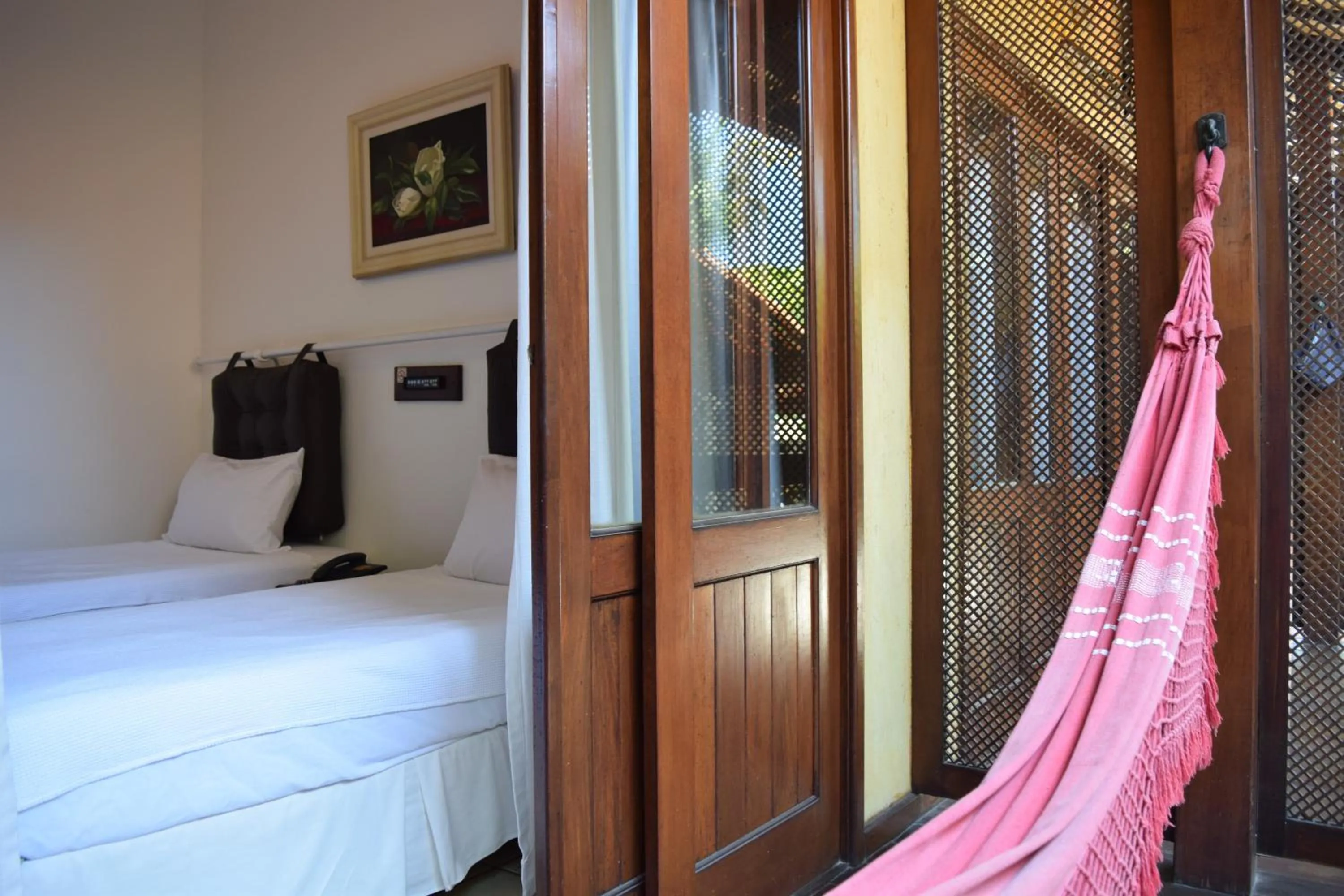 Bedroom, Bed in Hotel Pousada Encanto de Itapoan