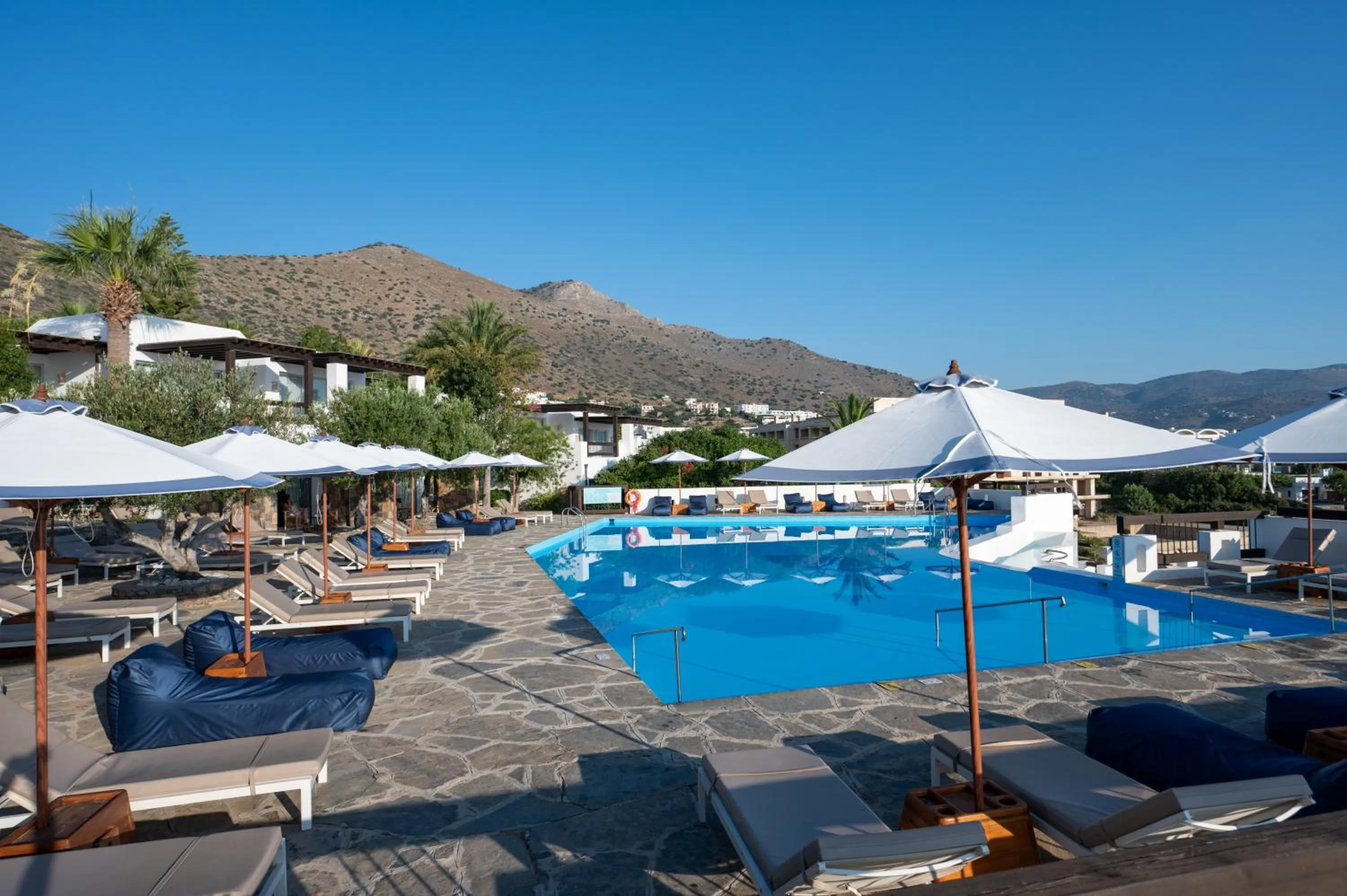 Pool view in Aquila Elounda Village Resort, Suites & Spa