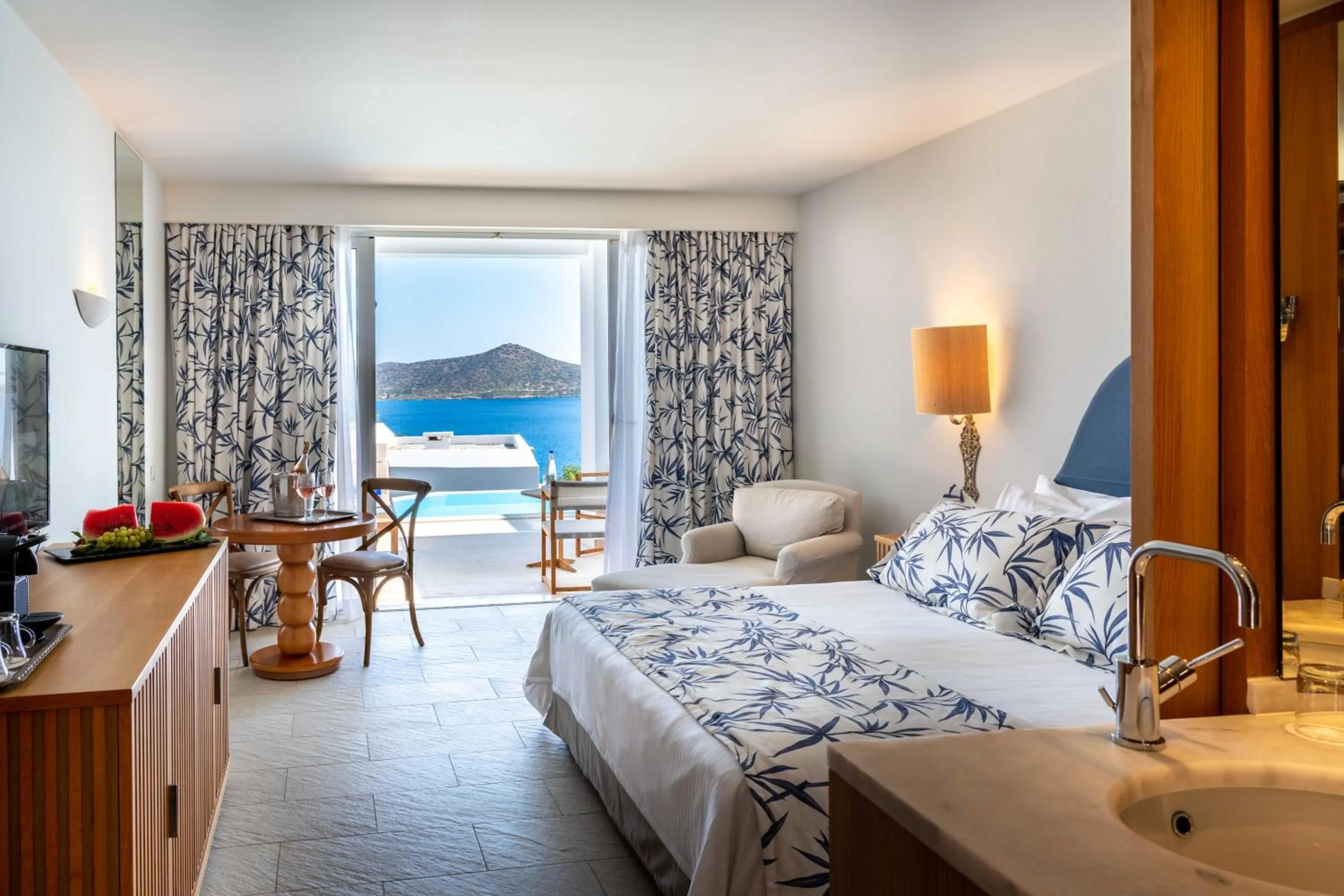 Bedroom, Bed in Aquila Elounda Village Resort, Suites & Spa