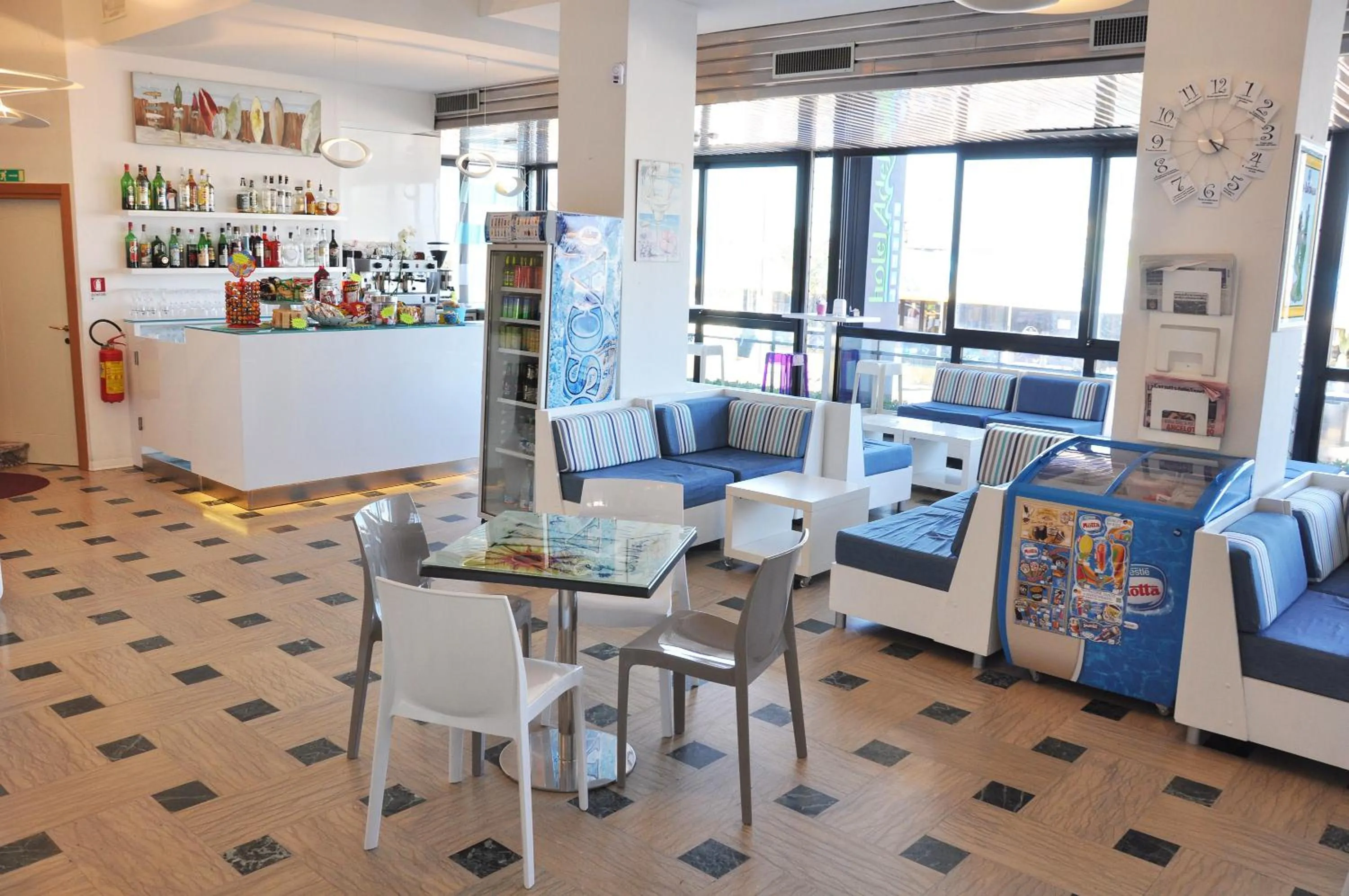 Communal lounge/ TV room in Hotel Adelphi