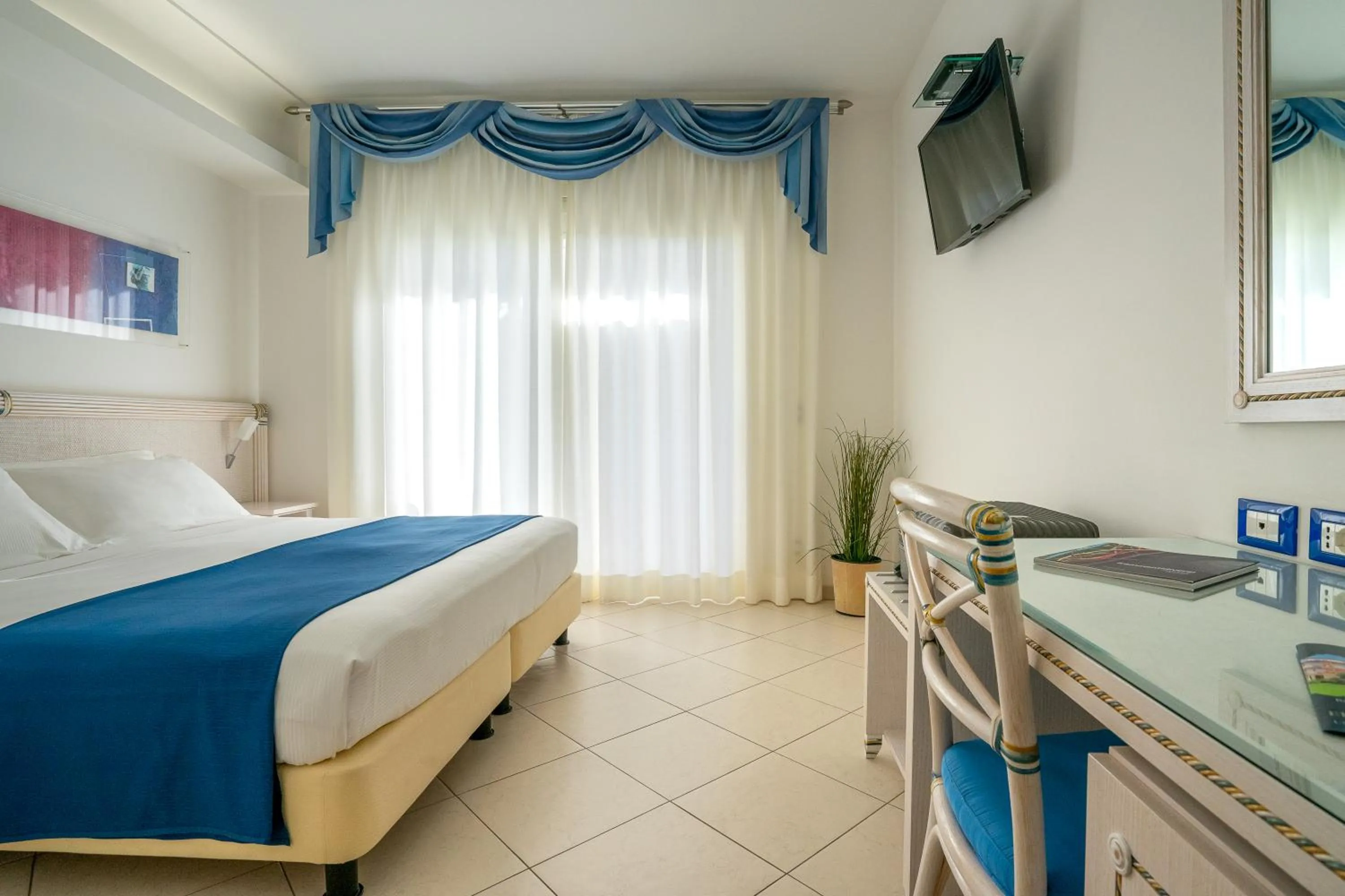 Bed in Elaia Garden Hotel