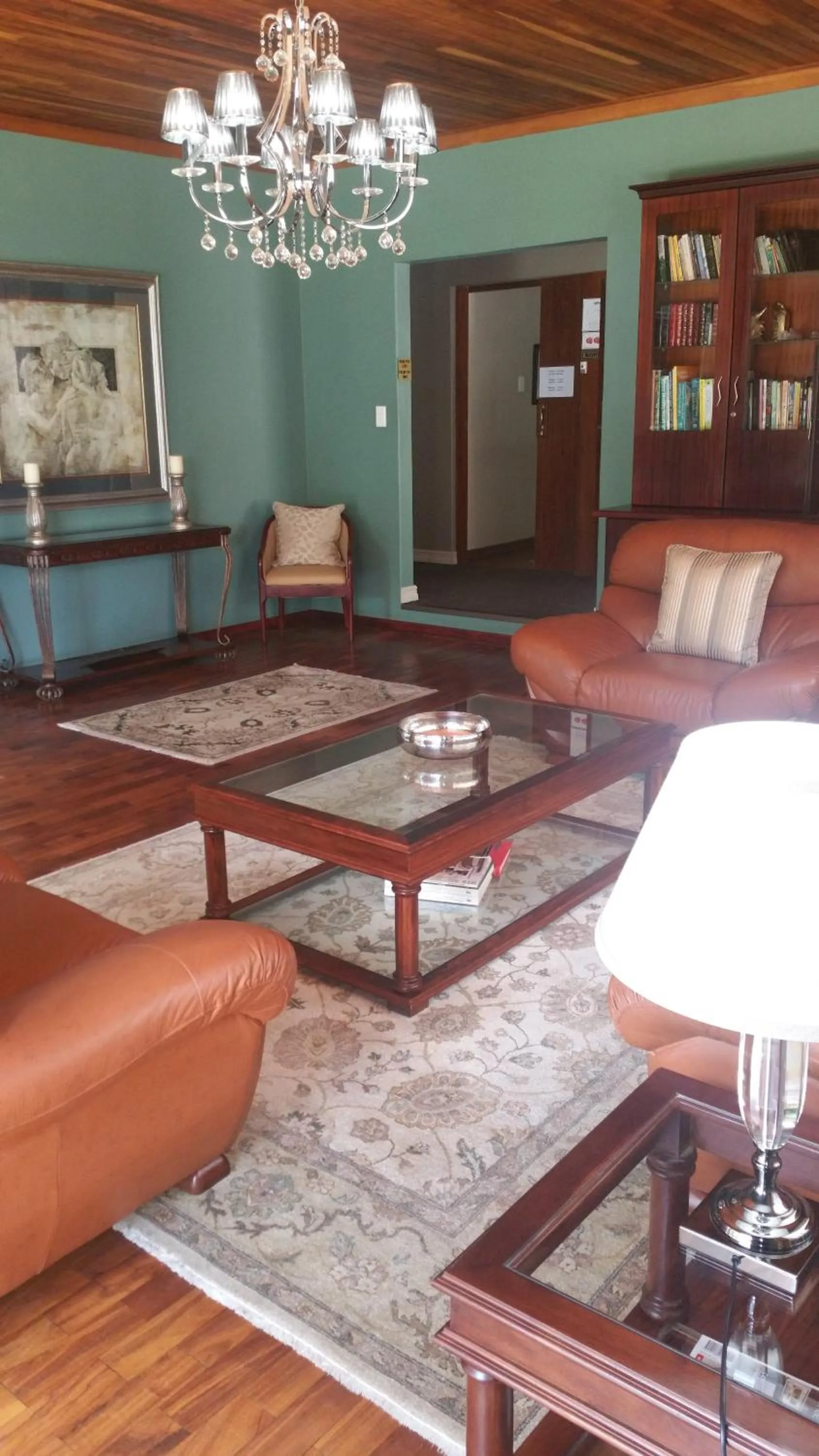 Communal lounge/ TV room in Bayswater Lodge