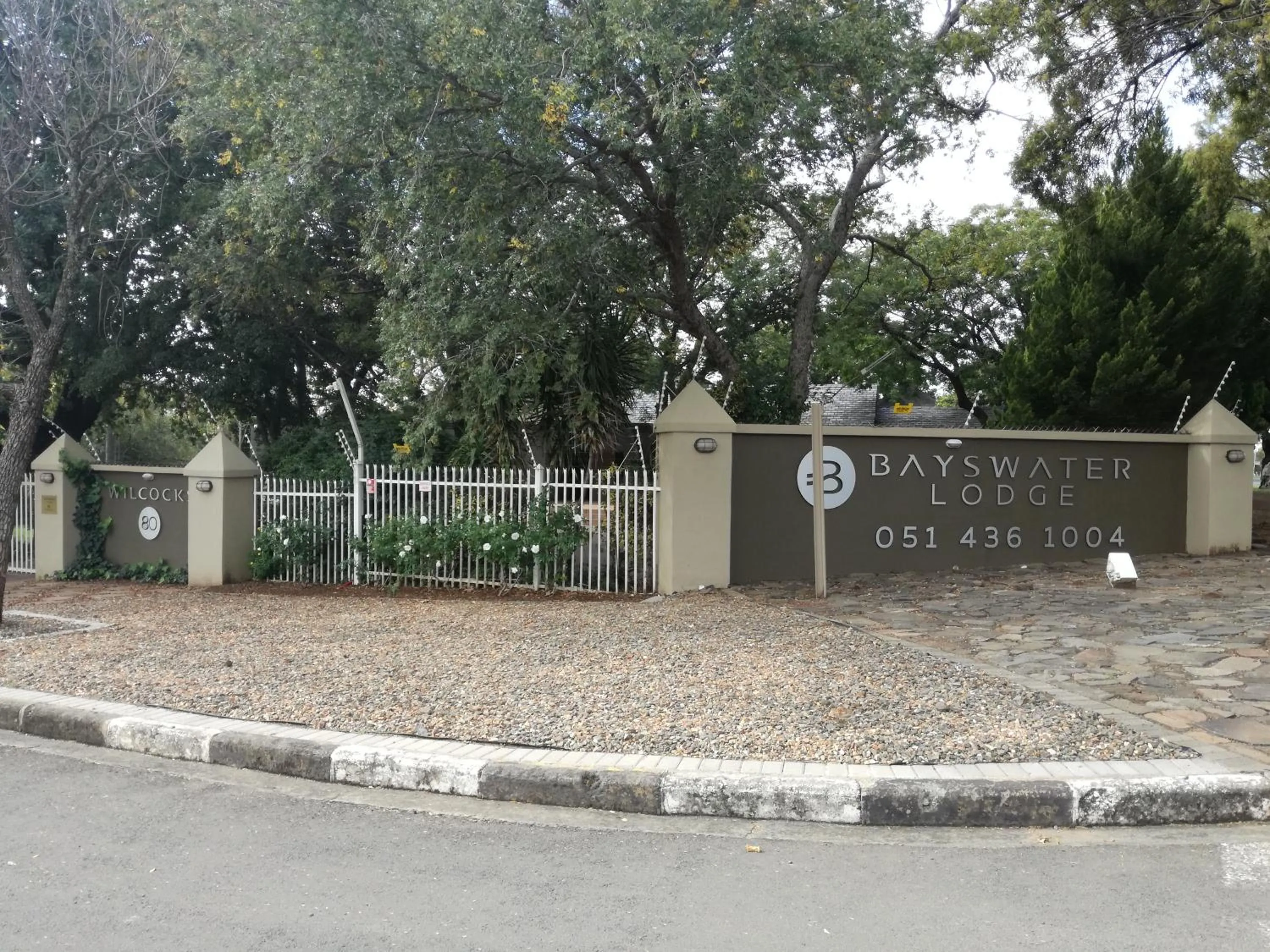 Property logo or sign in Bayswater Lodge