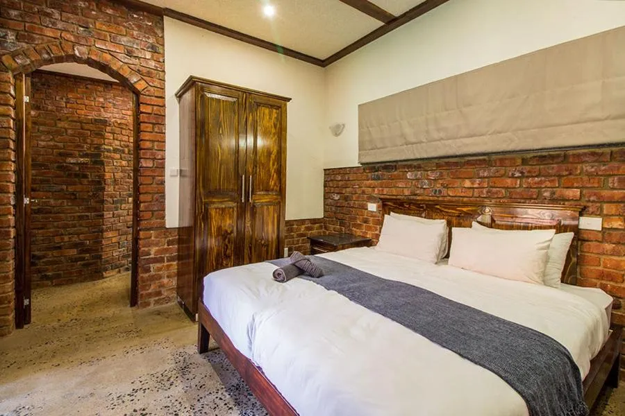 Bed in Stephan's Guest House