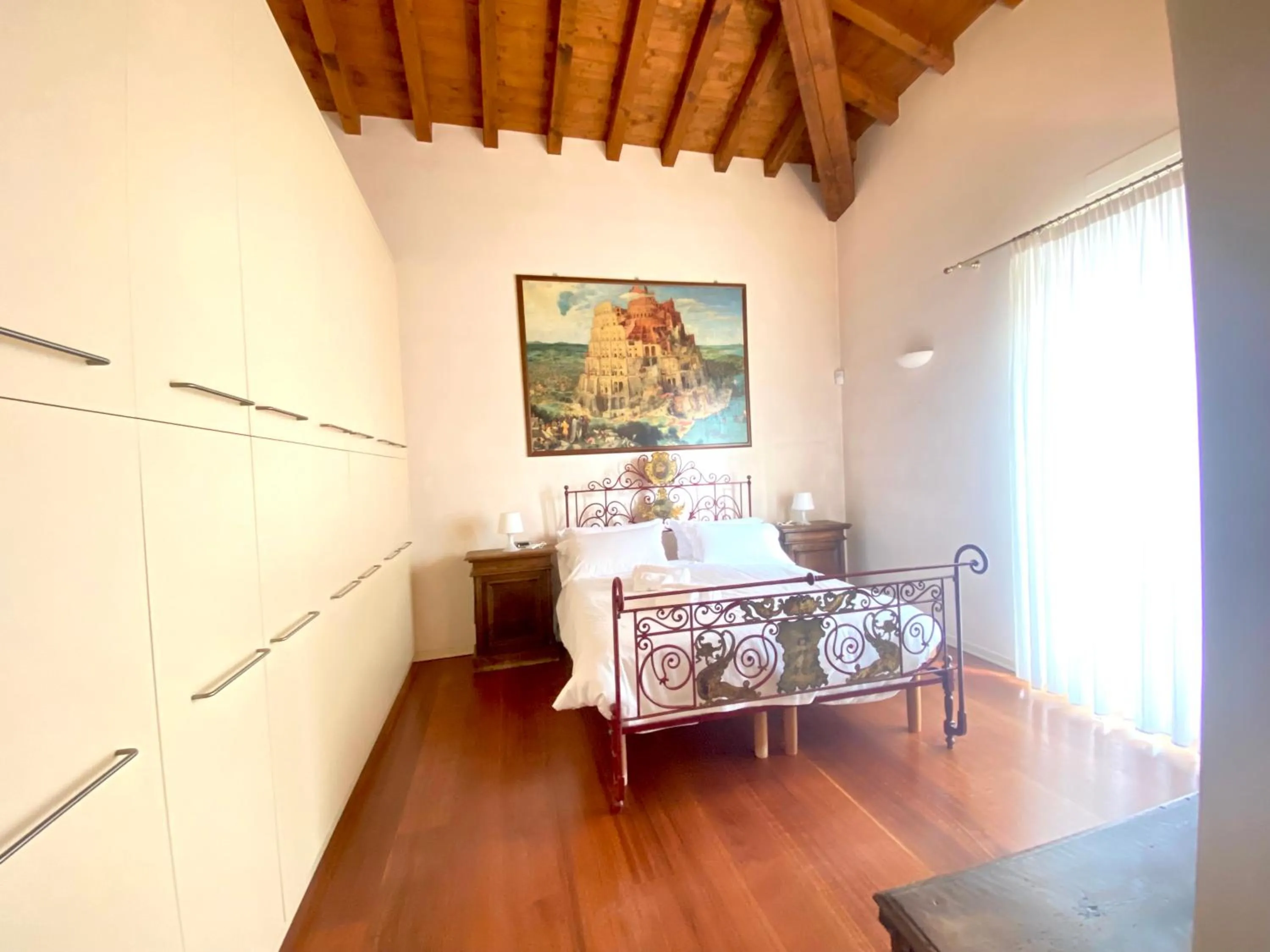 Bedroom in Residence Corte Ferrari -Ciao Vacanze-