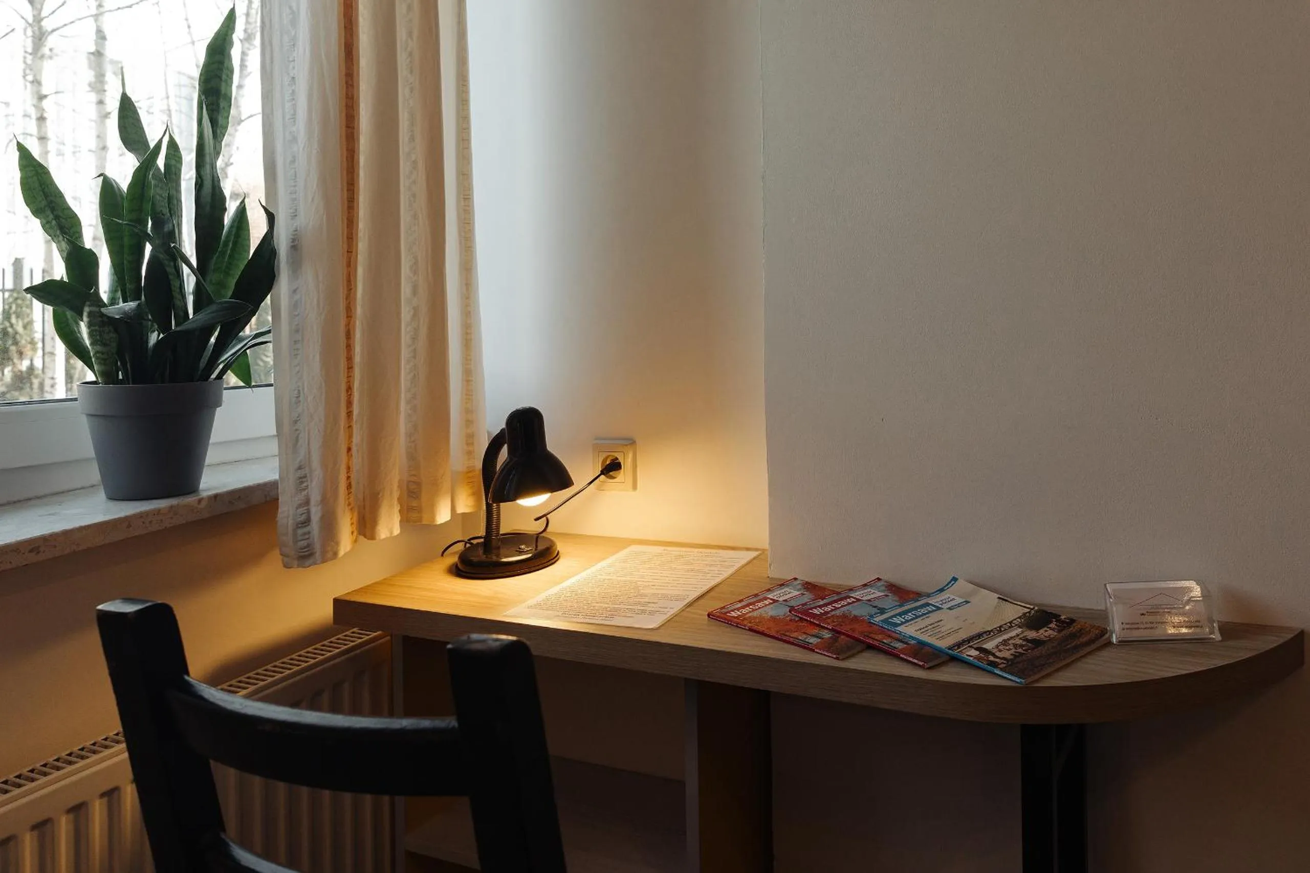 Seating area in Arcus Premium Hostel