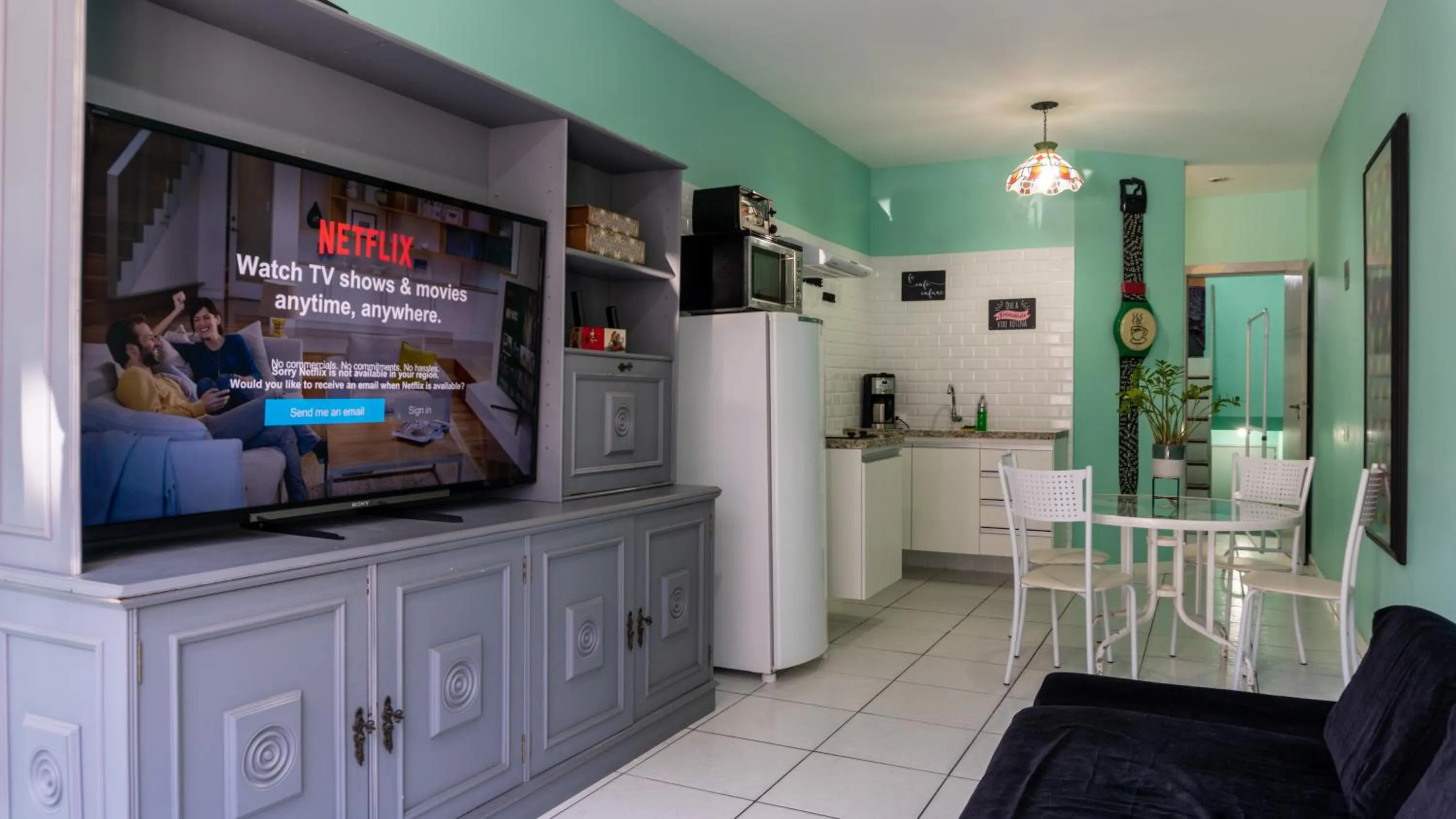 Communal lounge/ TV room in Duplex charmoso - Ótima localização