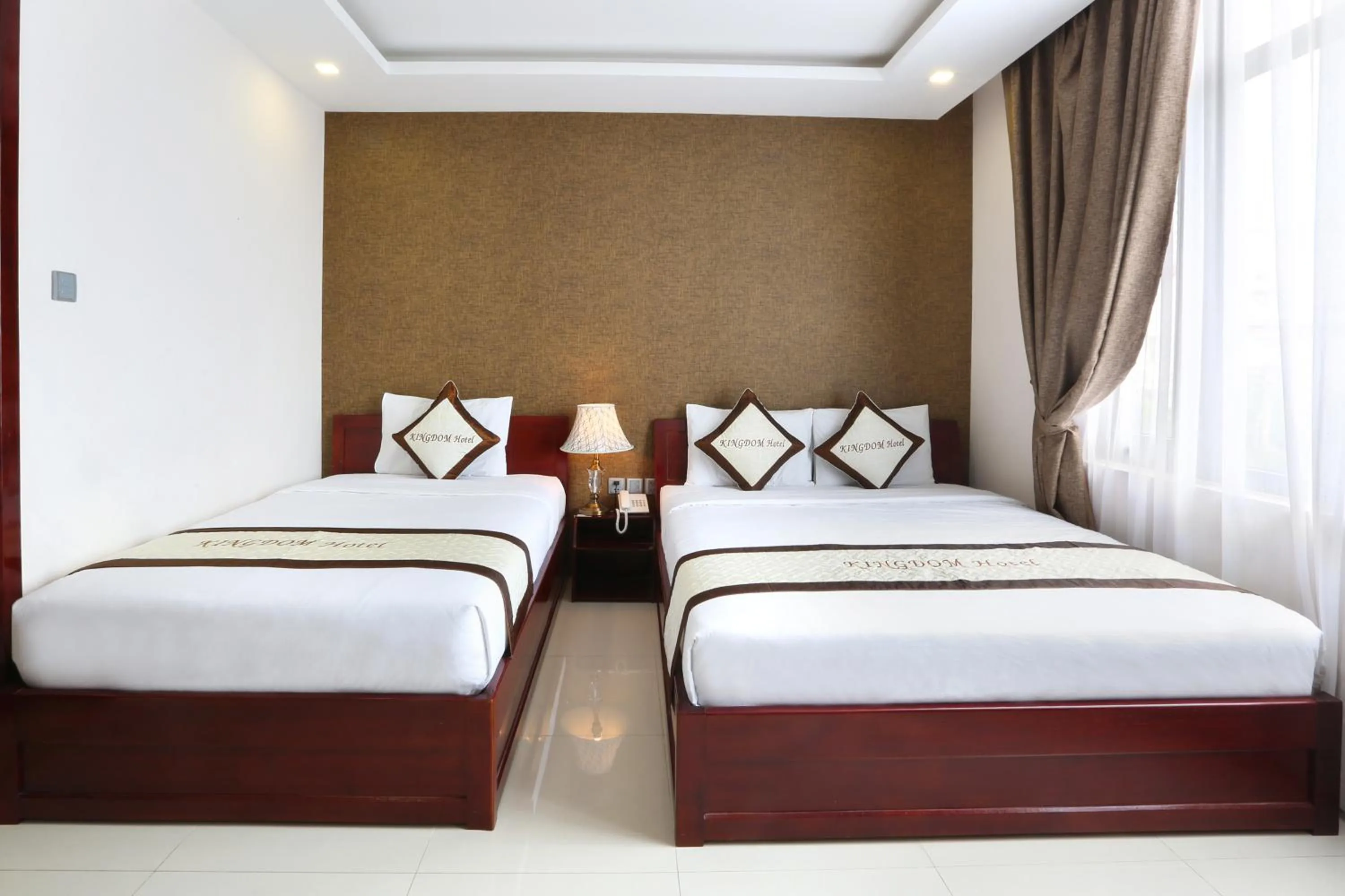 Photo of the whole room, Bed in Kingdom Danang Hotel