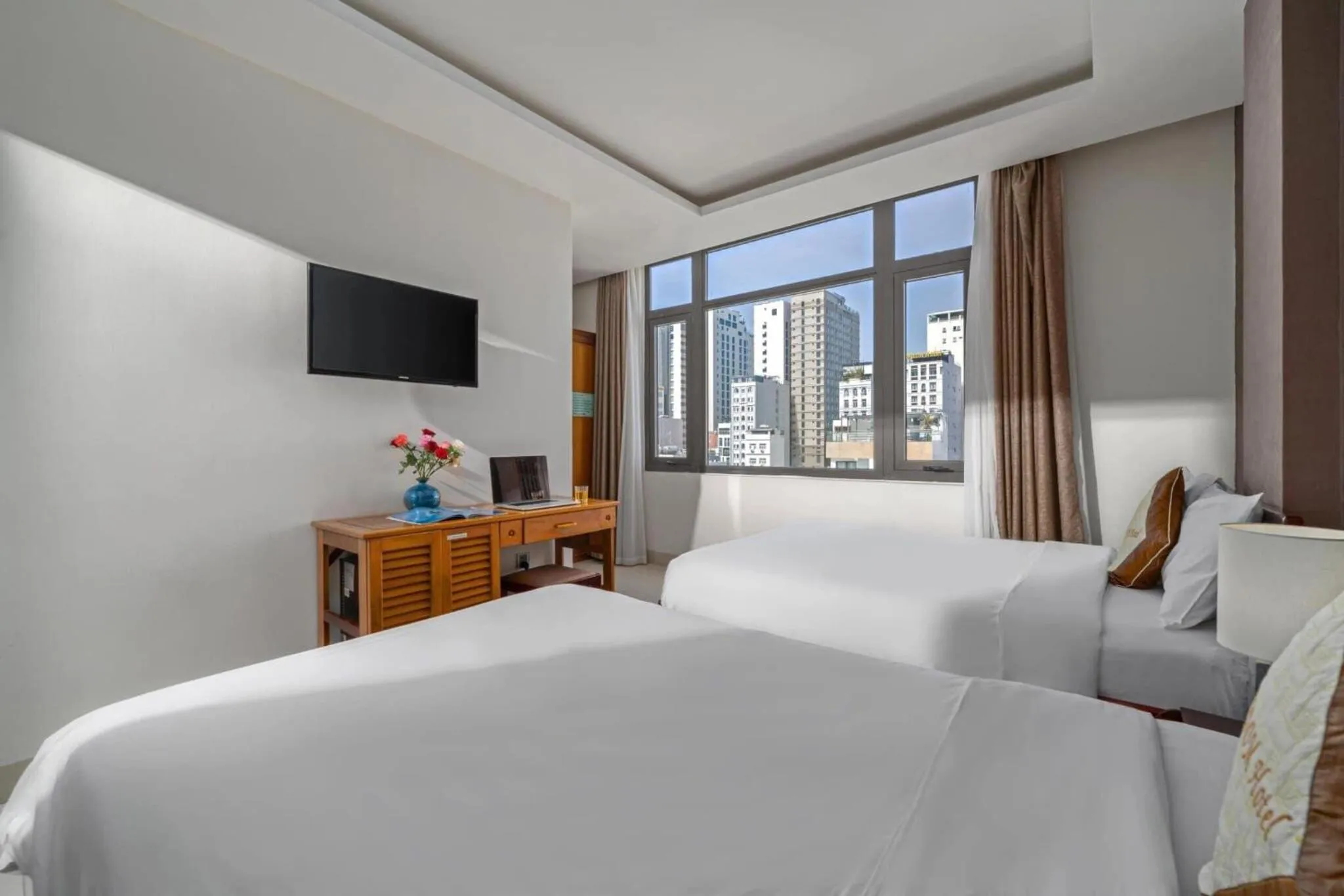 Bed in Kingdom Danang Hotel