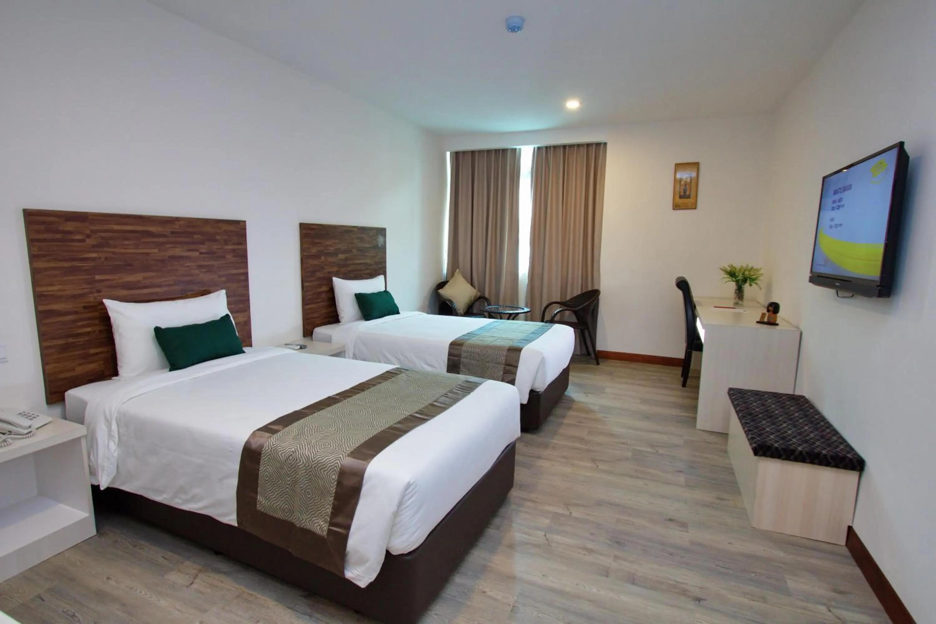 Bed in Molek Garden Hotel