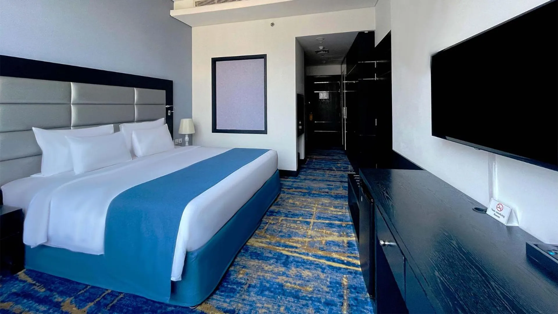 Bed in Signature 1 Hotel Tecom