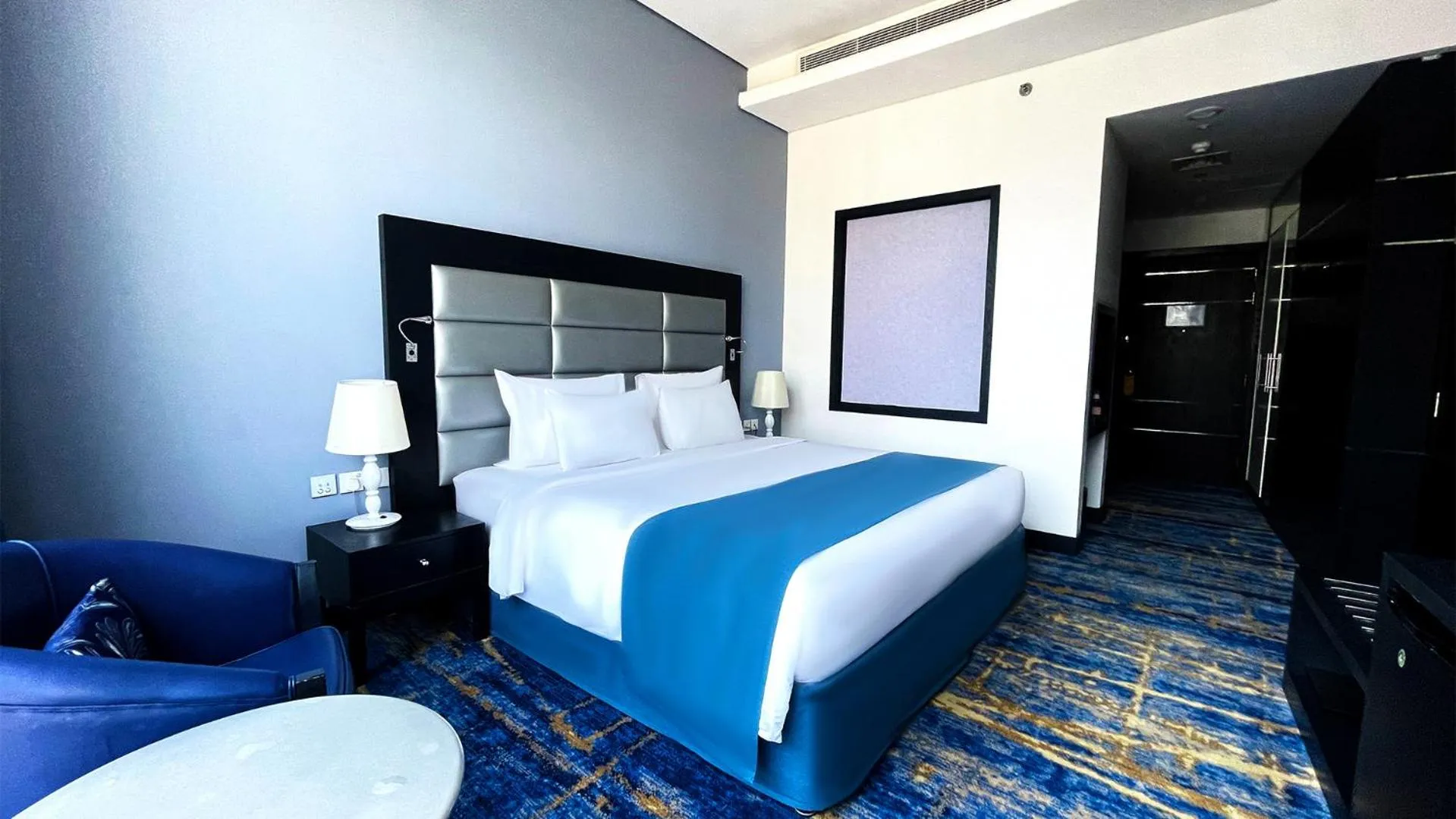 Bed in Signature 1 Hotel Tecom