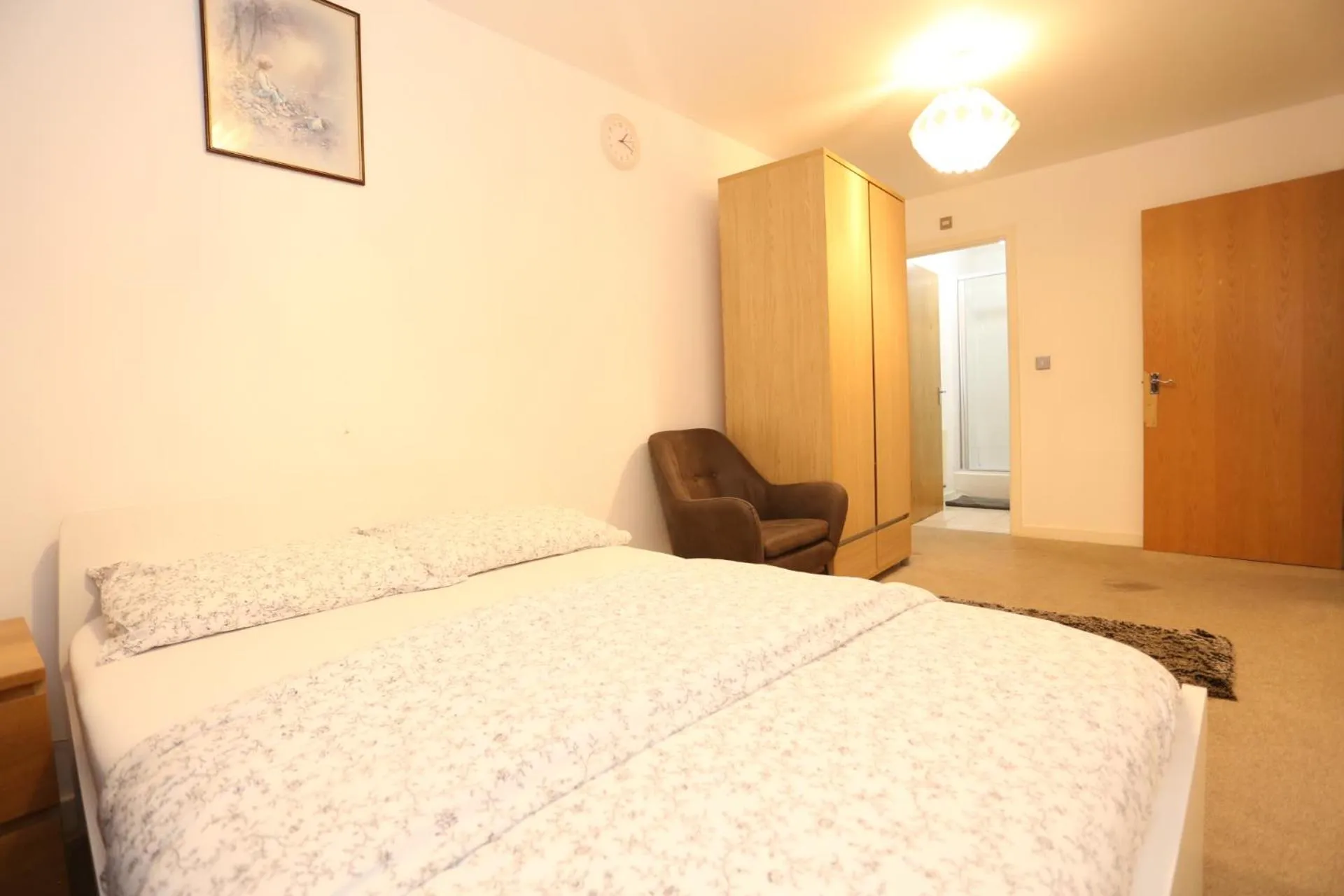 Bed in Bridge House Apartment