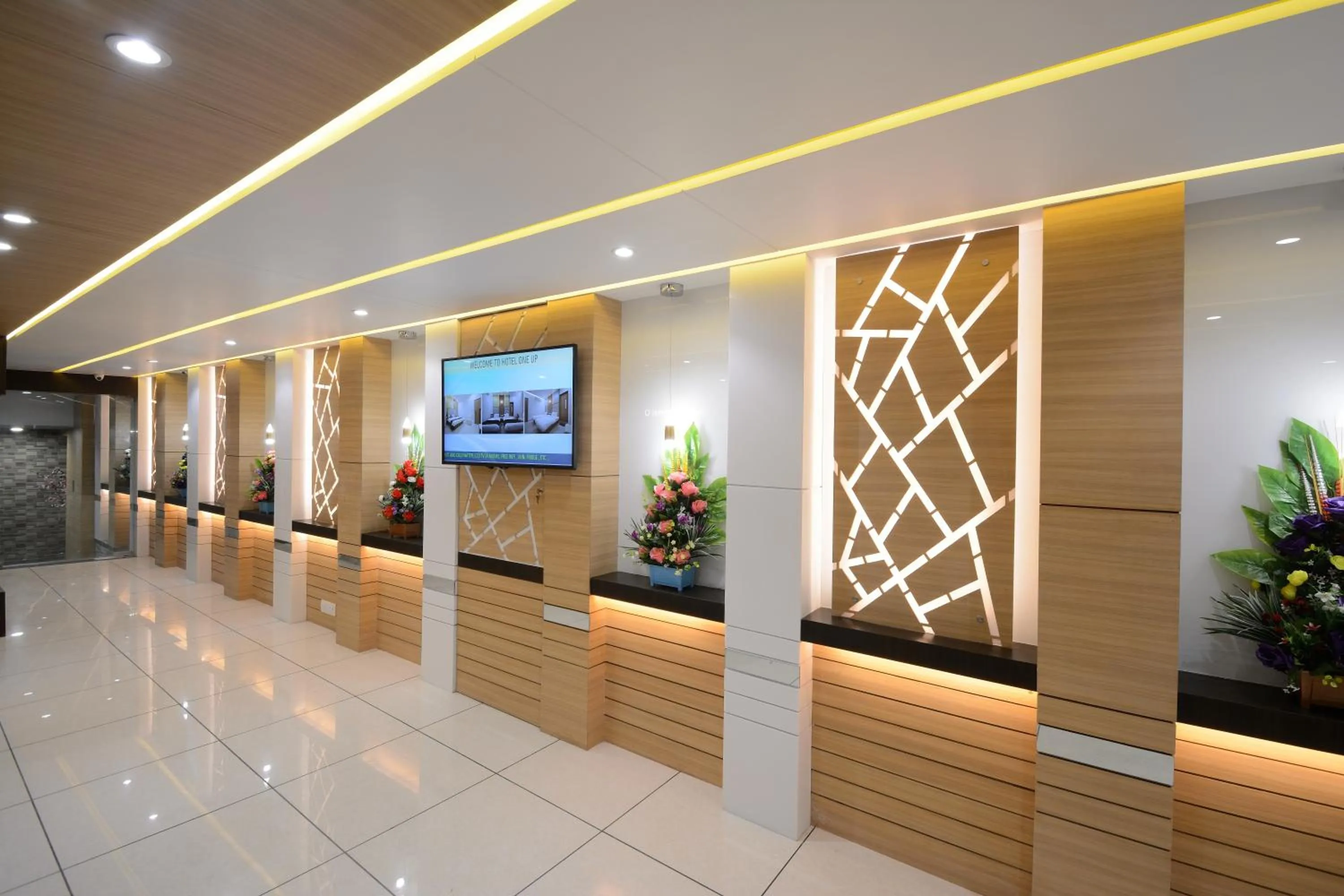 Communal lounge/ TV room in Hotel One Up