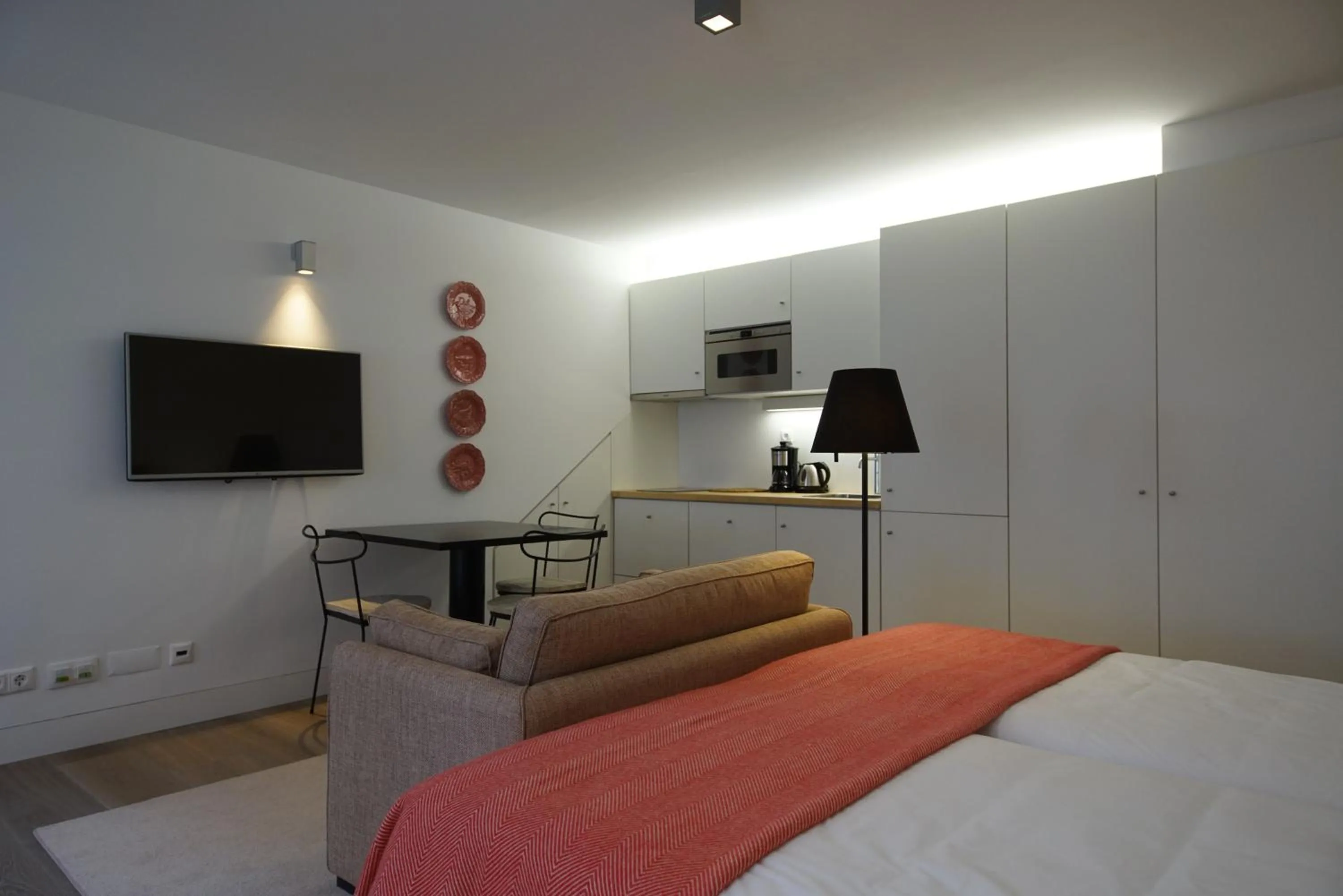 Living room, Bed in Alma Moura Residences