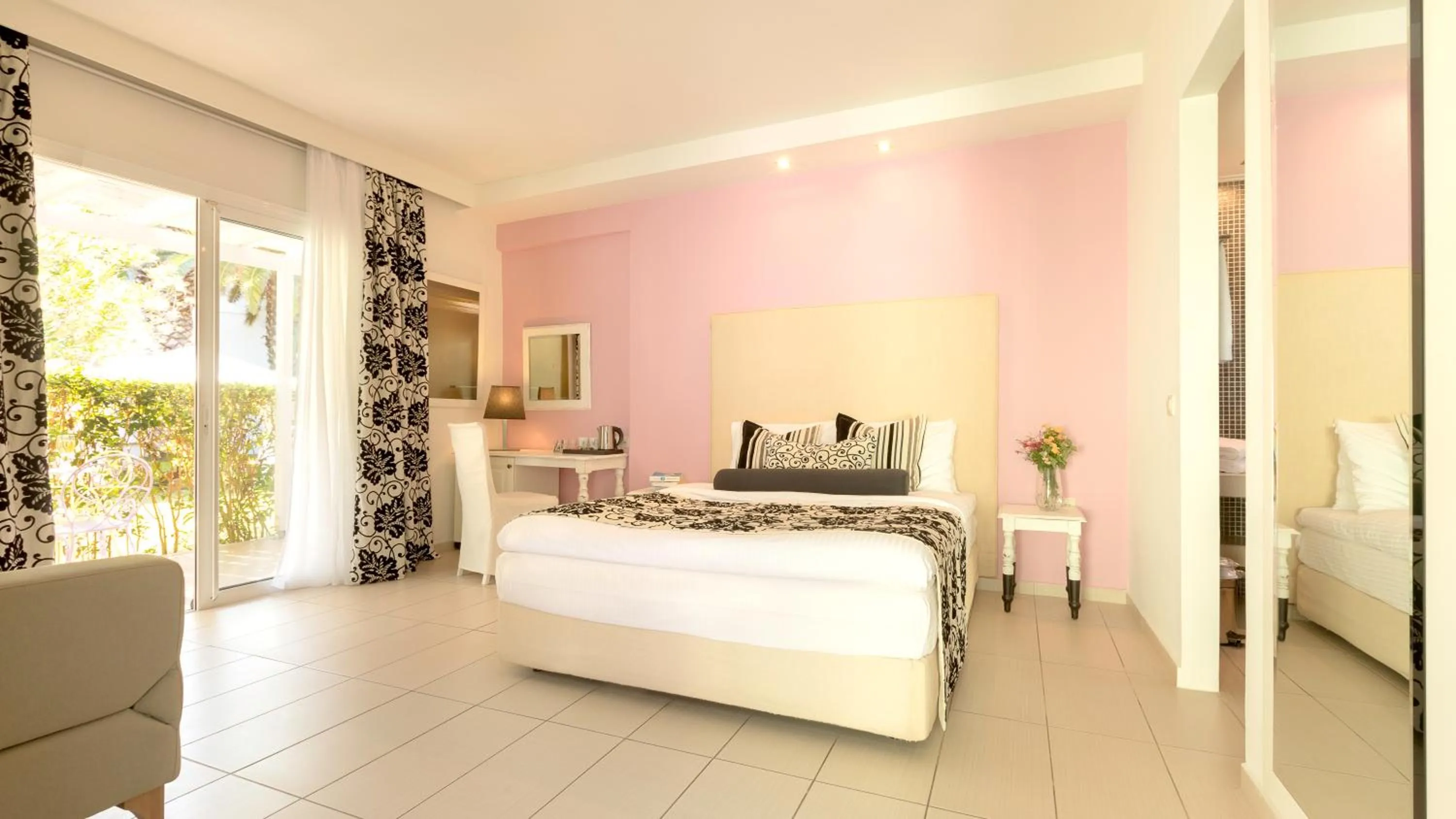 Bed in Mandraki Village Boutique Hotel