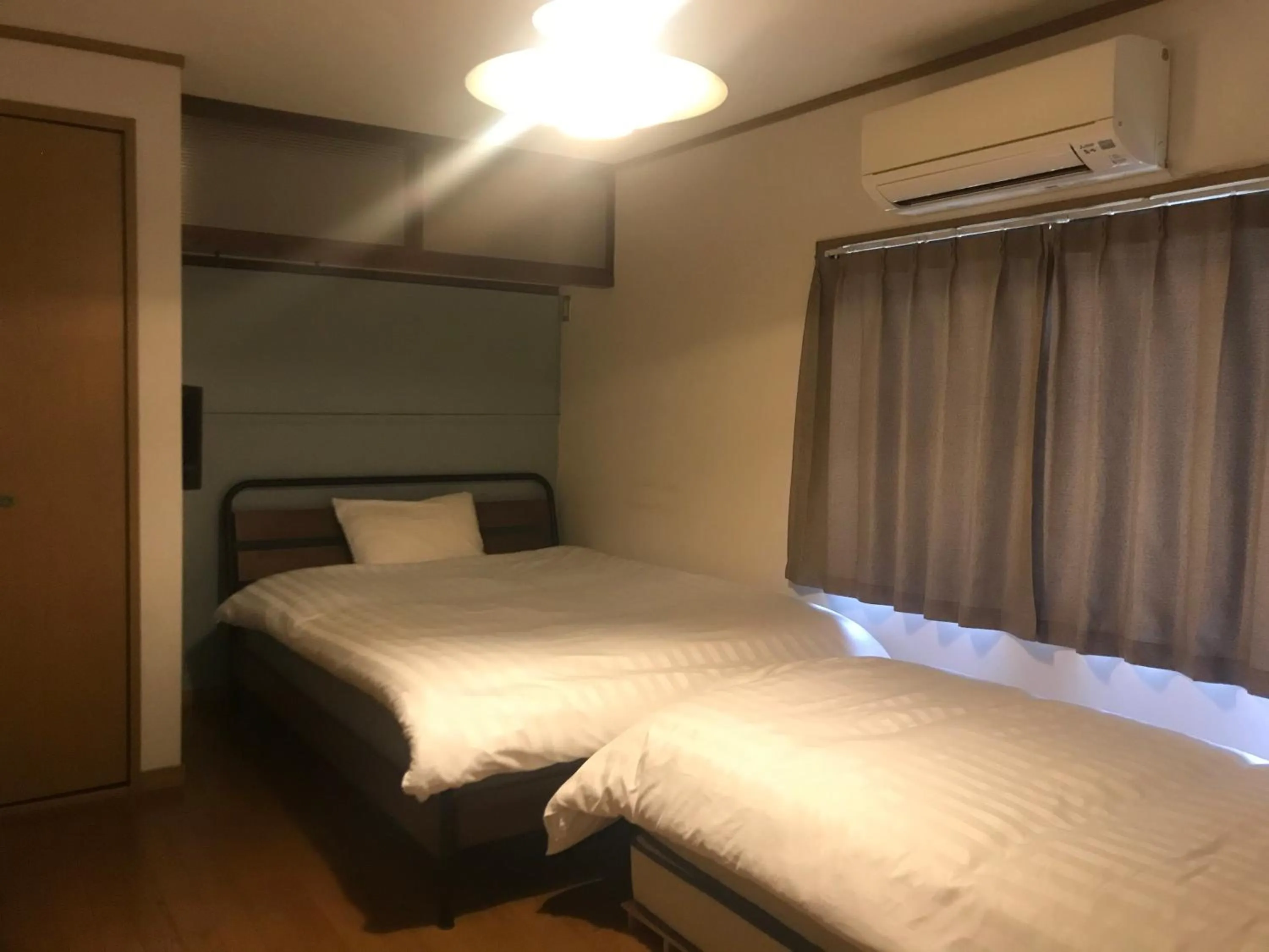 Bed in NOW TRAVEL ShinOsaka