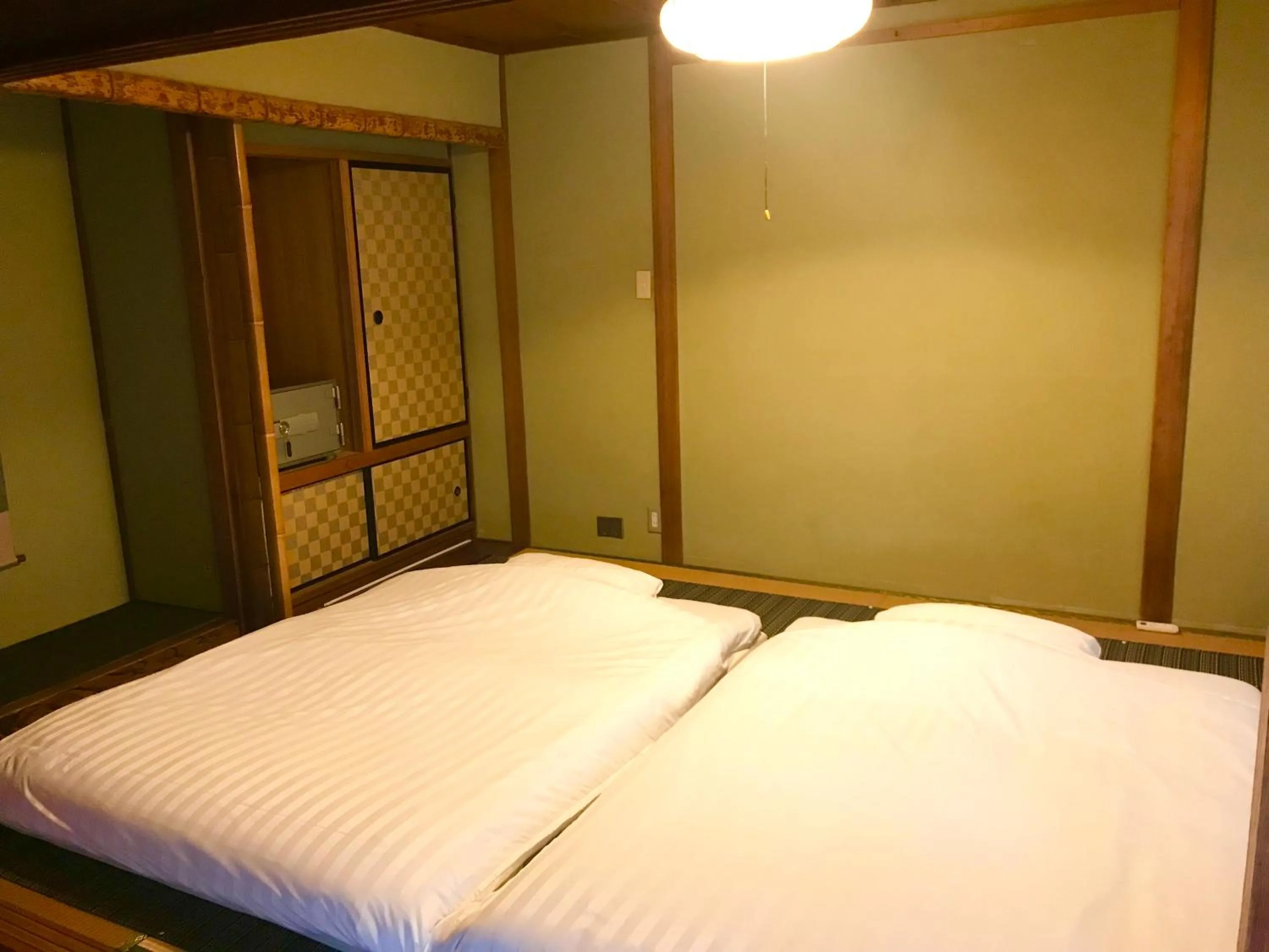 Bed in NOW TRAVEL ShinOsaka