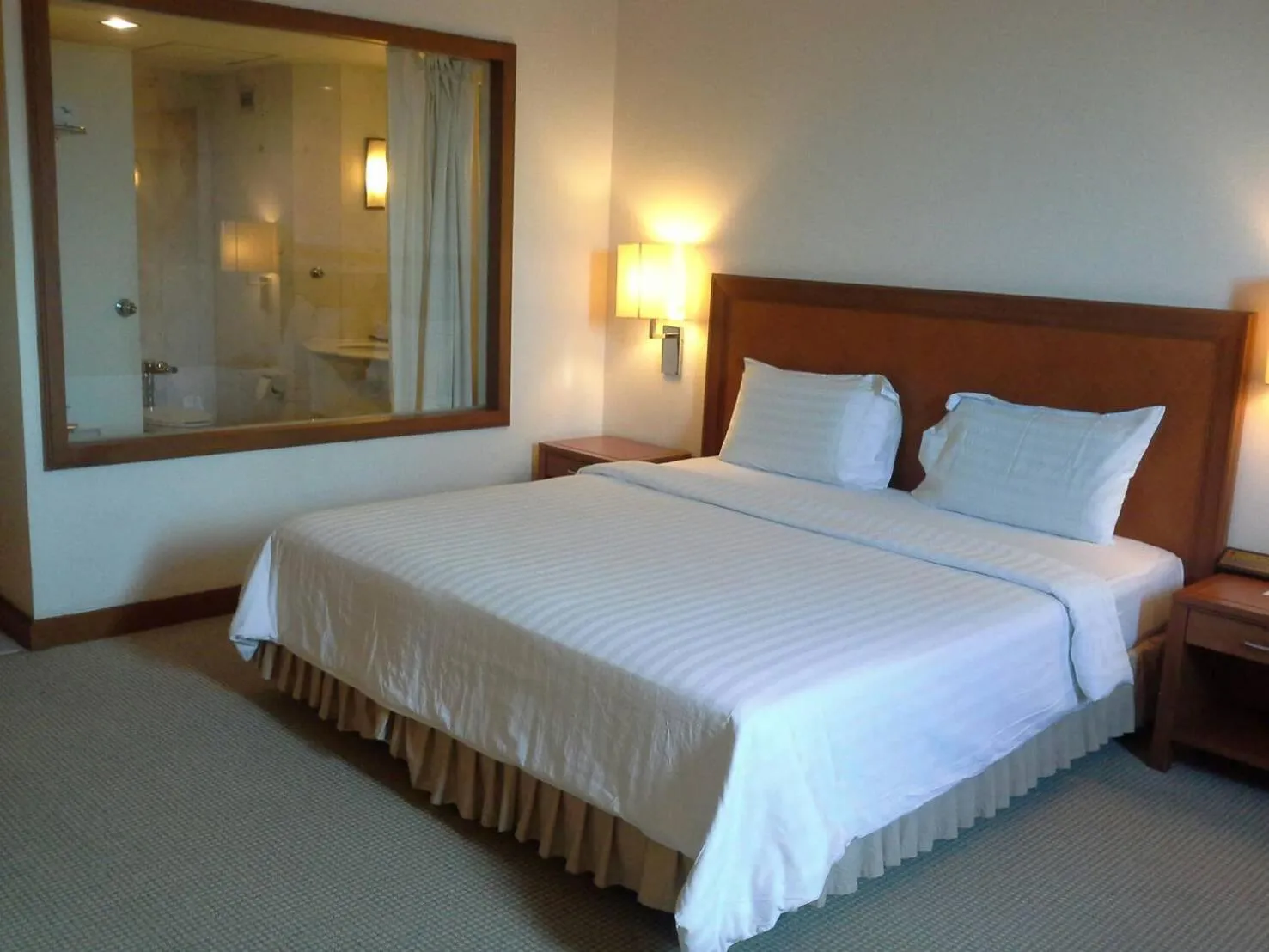 Bed in Grand Mandarin Betong Hotel