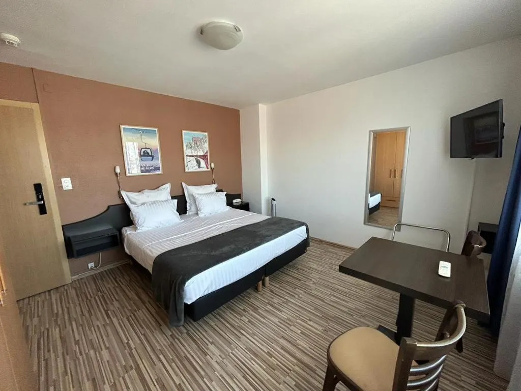 Bed in Primadom Aparthotel