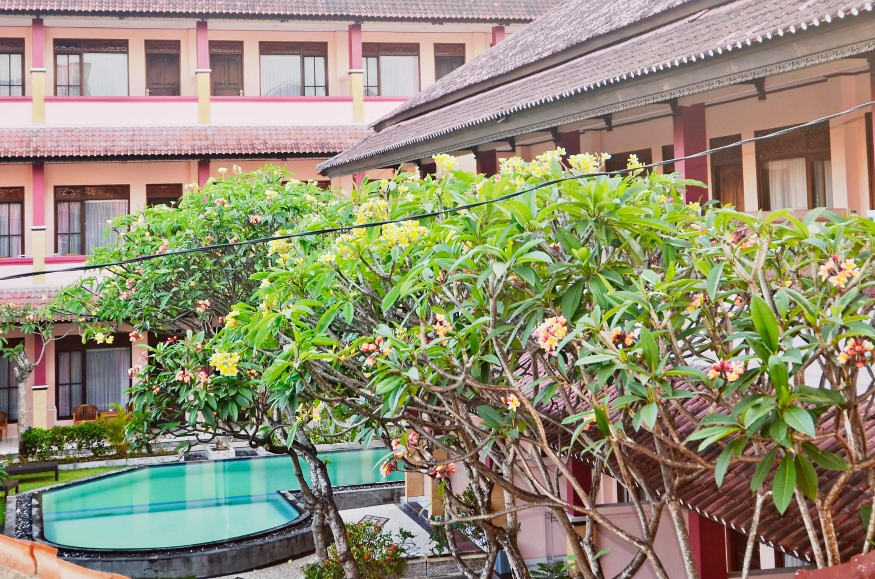 Garden view in Pesona Beach Inn