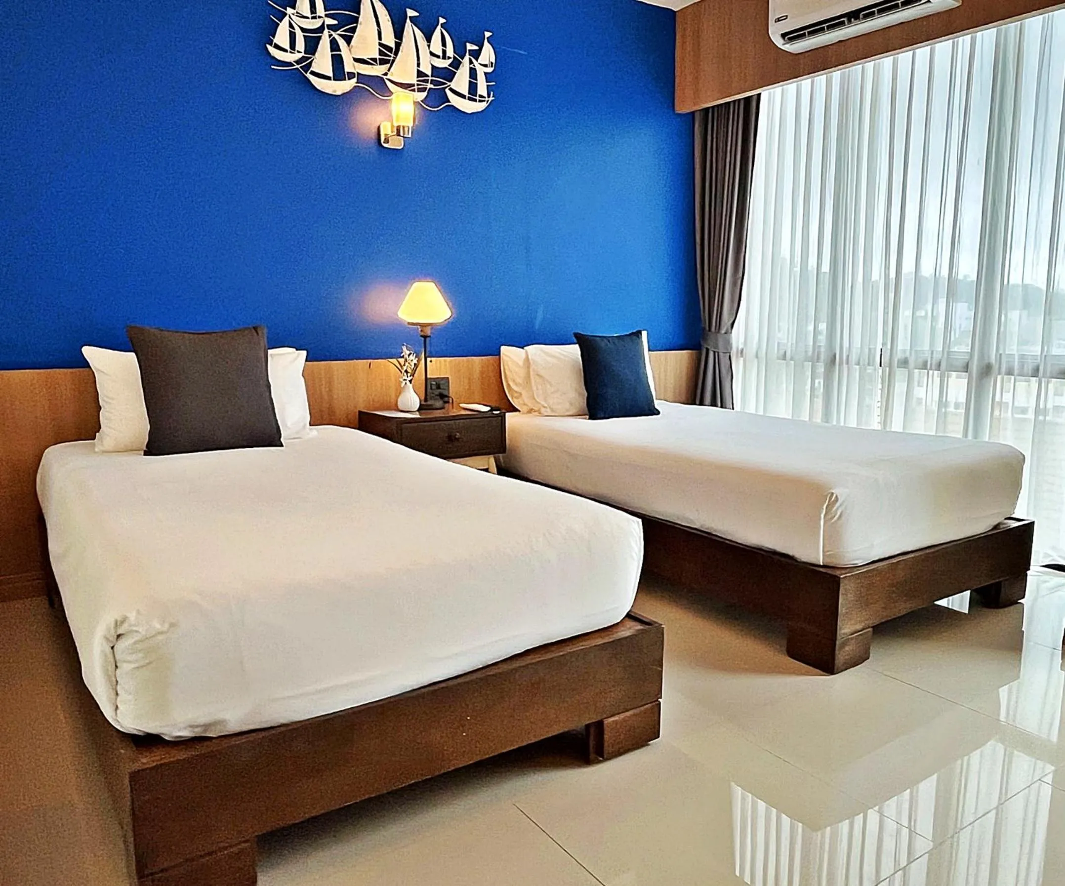 Bed in The Sixteenth Naiyang Beach Hotel- Free Schedule Airport Shuttle