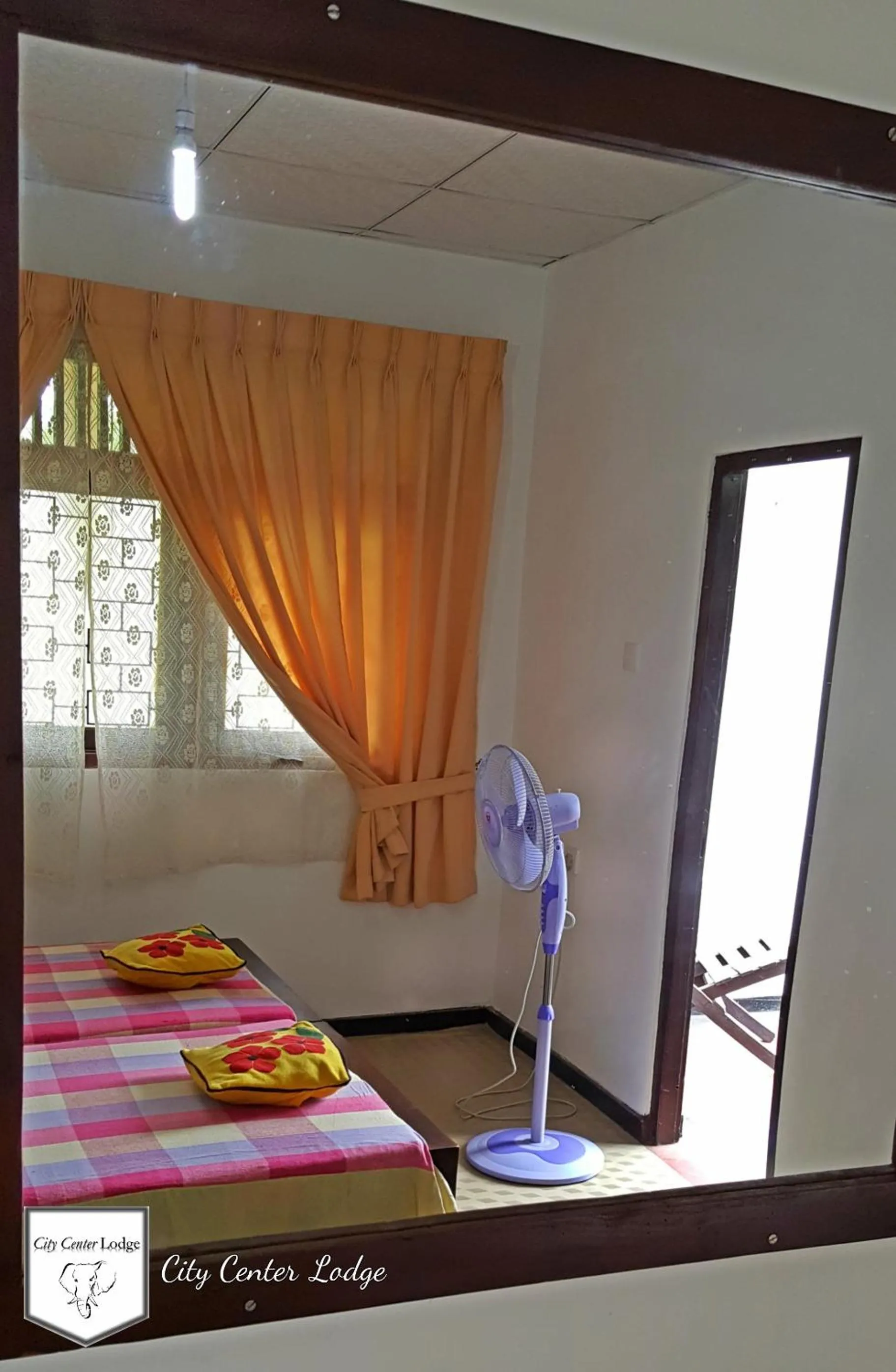 Photo of the whole room, Bed in City Centre Lodge