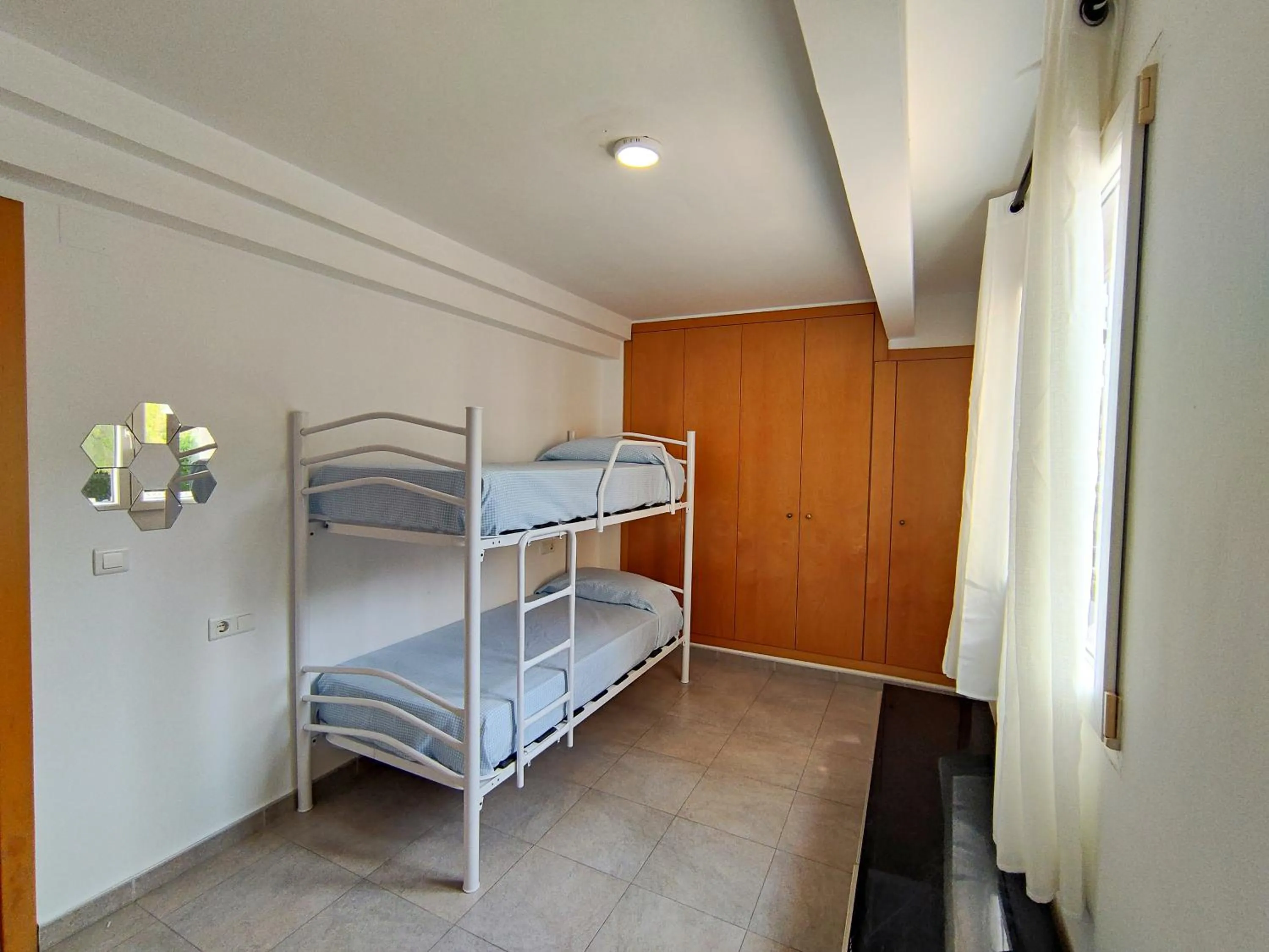 Bedroom, Bed in Apartamentos Gandía Centro 3000