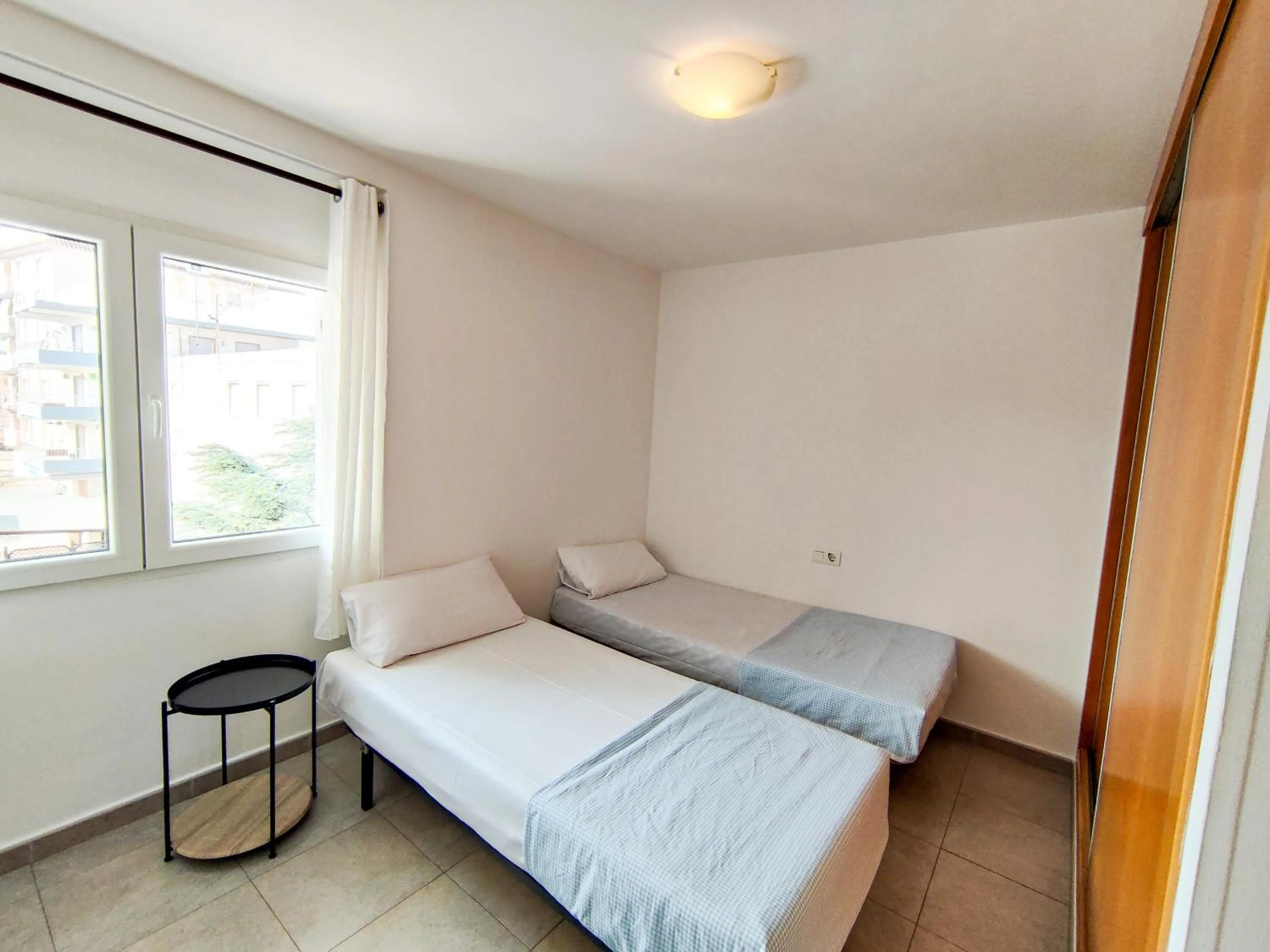 Bedroom, Bed in Apartamentos Gandía Centro 3000