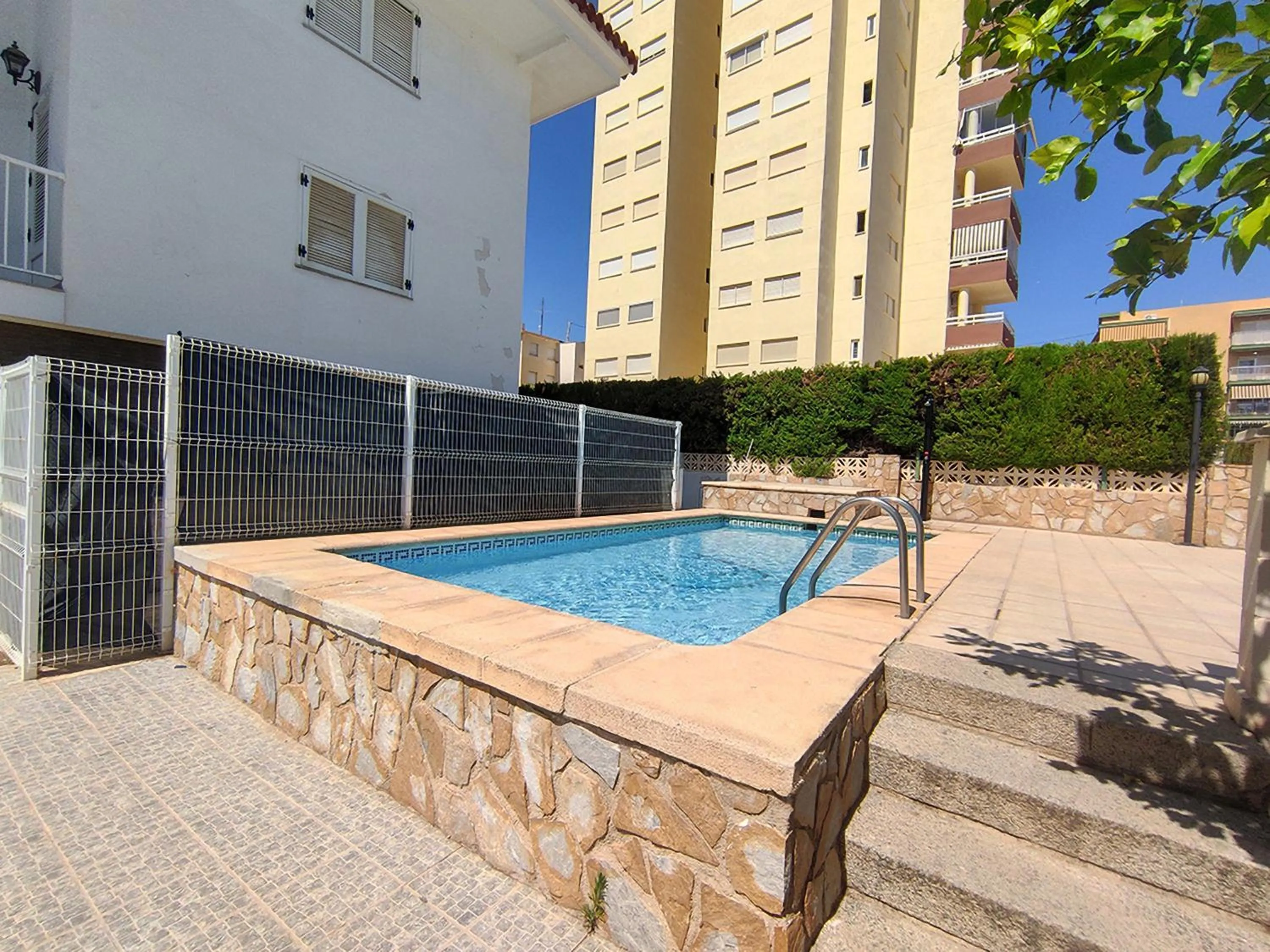 Swimming pool in Apartamentos Gandía Centro 3000