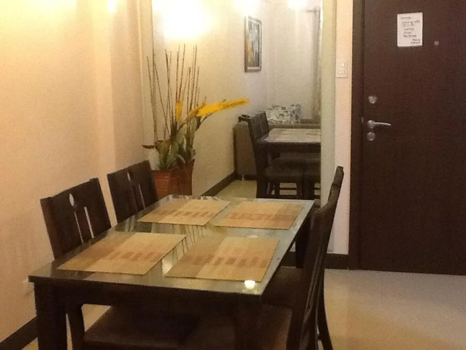 Dining area in Palm Tree Genlex Condo