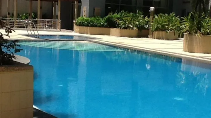 Day in Palm Tree Genlex Condo