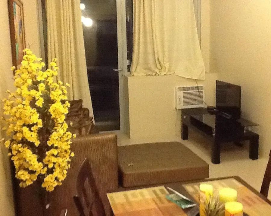 Living room in Palm Tree Genlex Condo