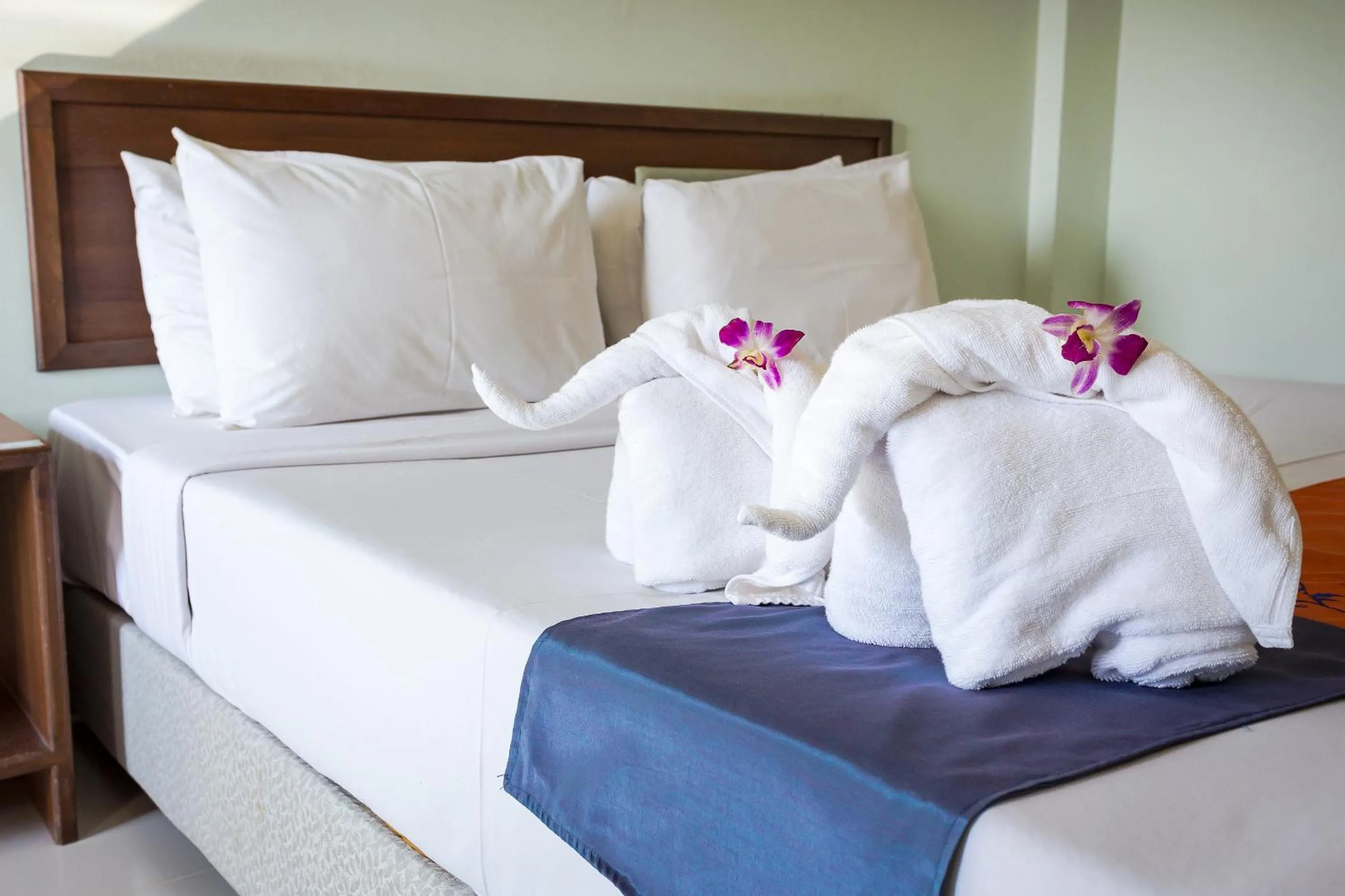 Bed in KYP Khunyuw Place Hotel โรงแรมเควายพี ขุนยูวเพลส ฝาง