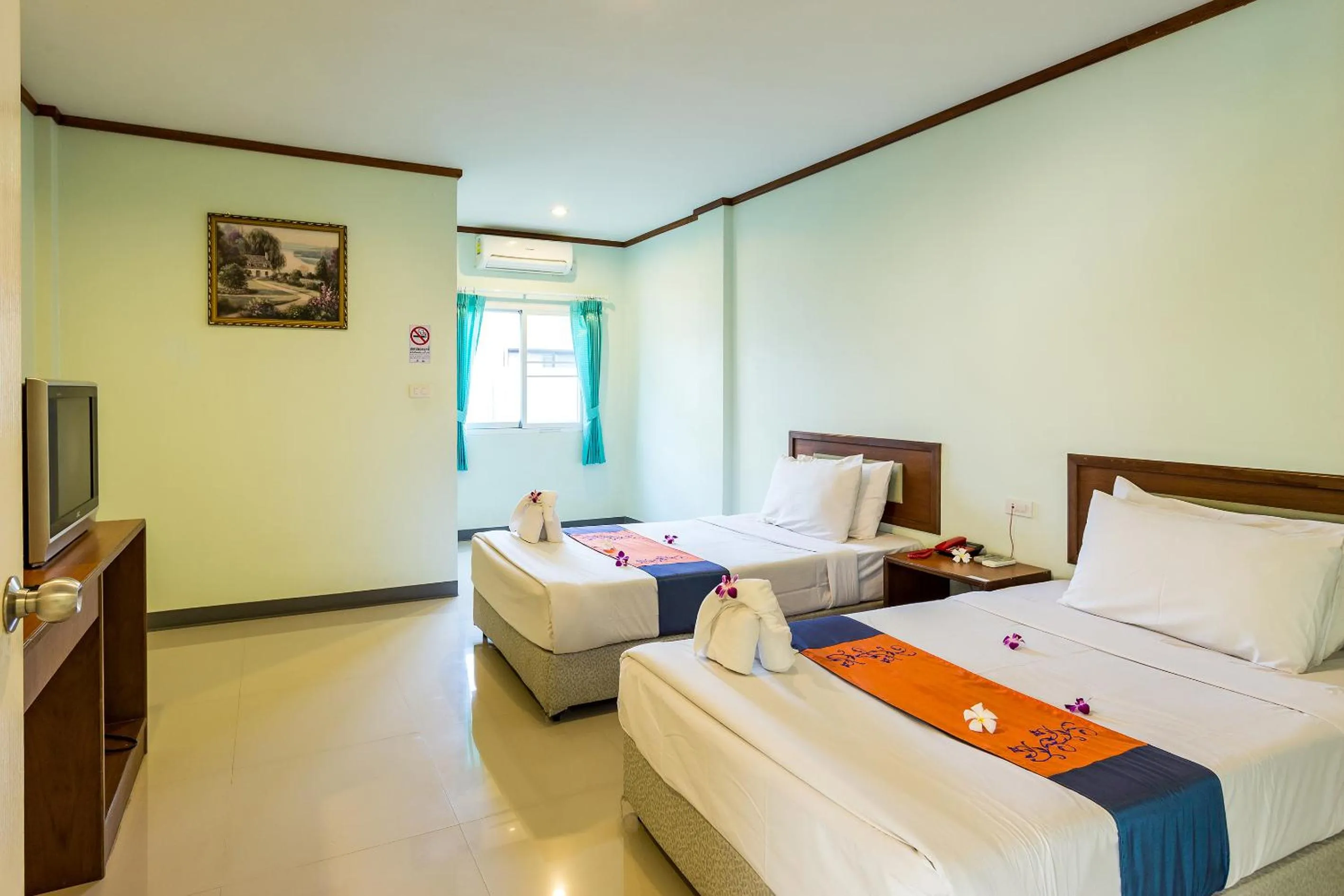 Photo of the whole room, Bed in KYP Khunyuw Place Hotel โรงแรมเควายพี ขุนยูวเพลส ฝาง